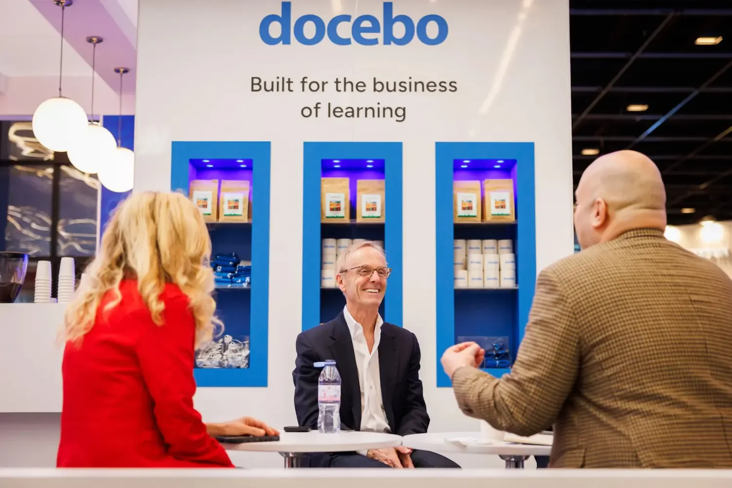 VIP networking at Docebo exhibition stand during industry summit