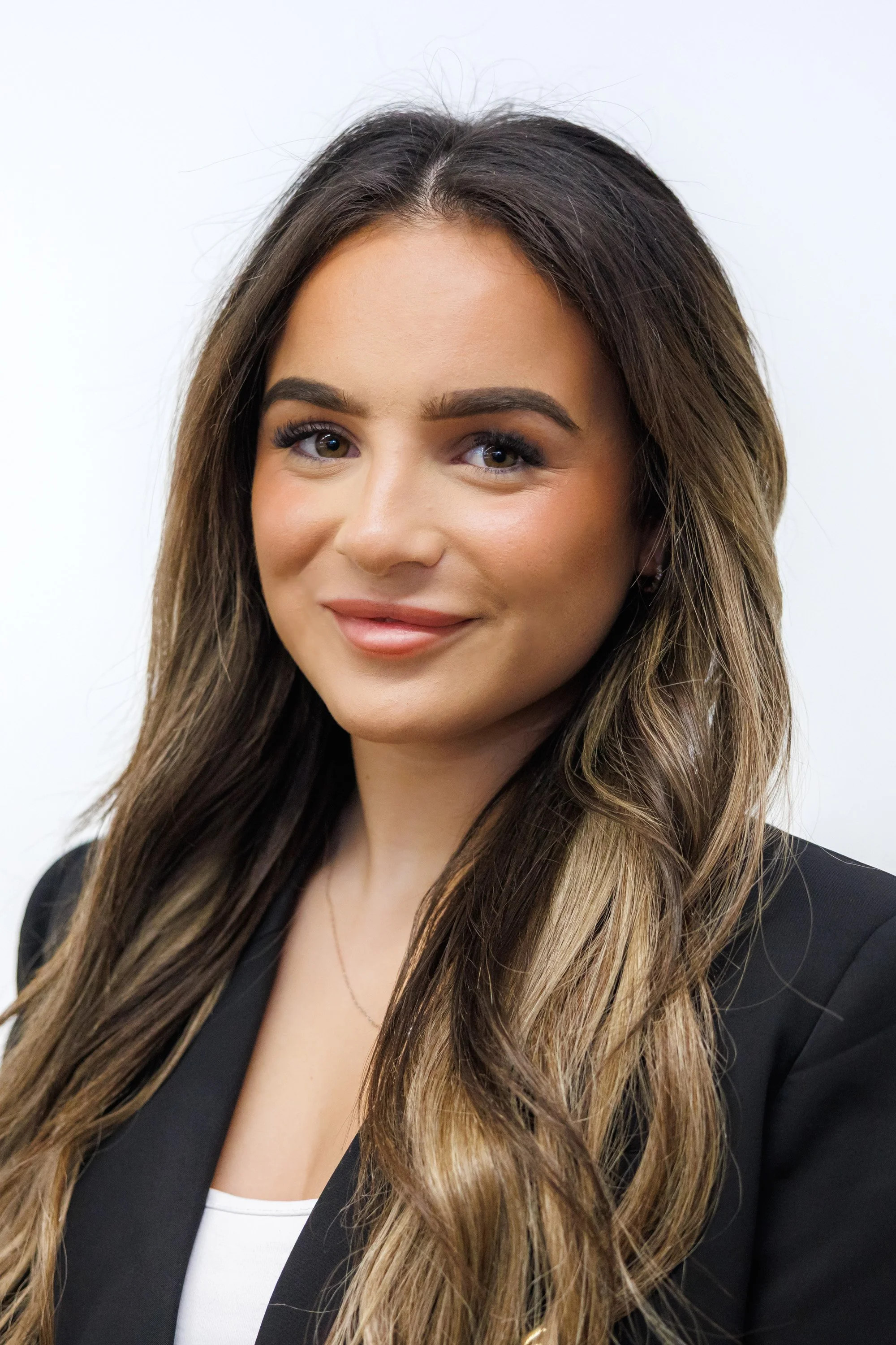 Corporate headshot with white background and flash light 