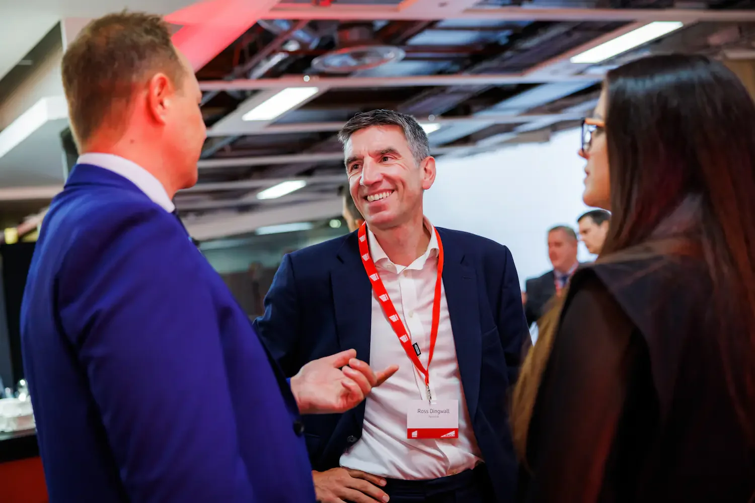 Delegates networking during a conference break