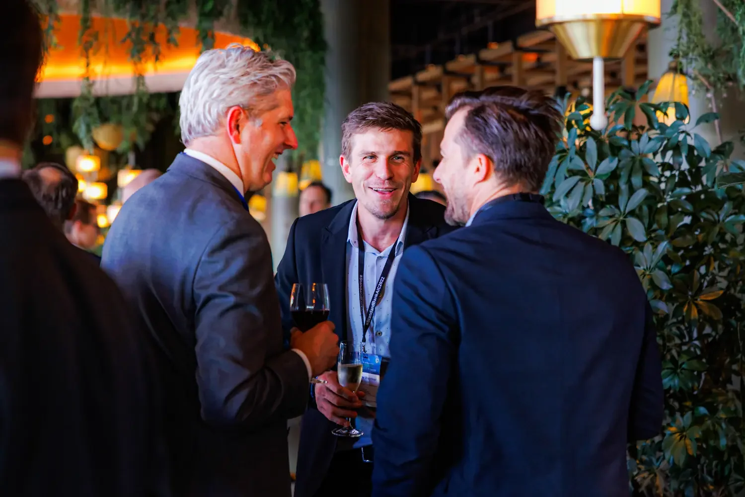 Corporate reception smiles and mingling