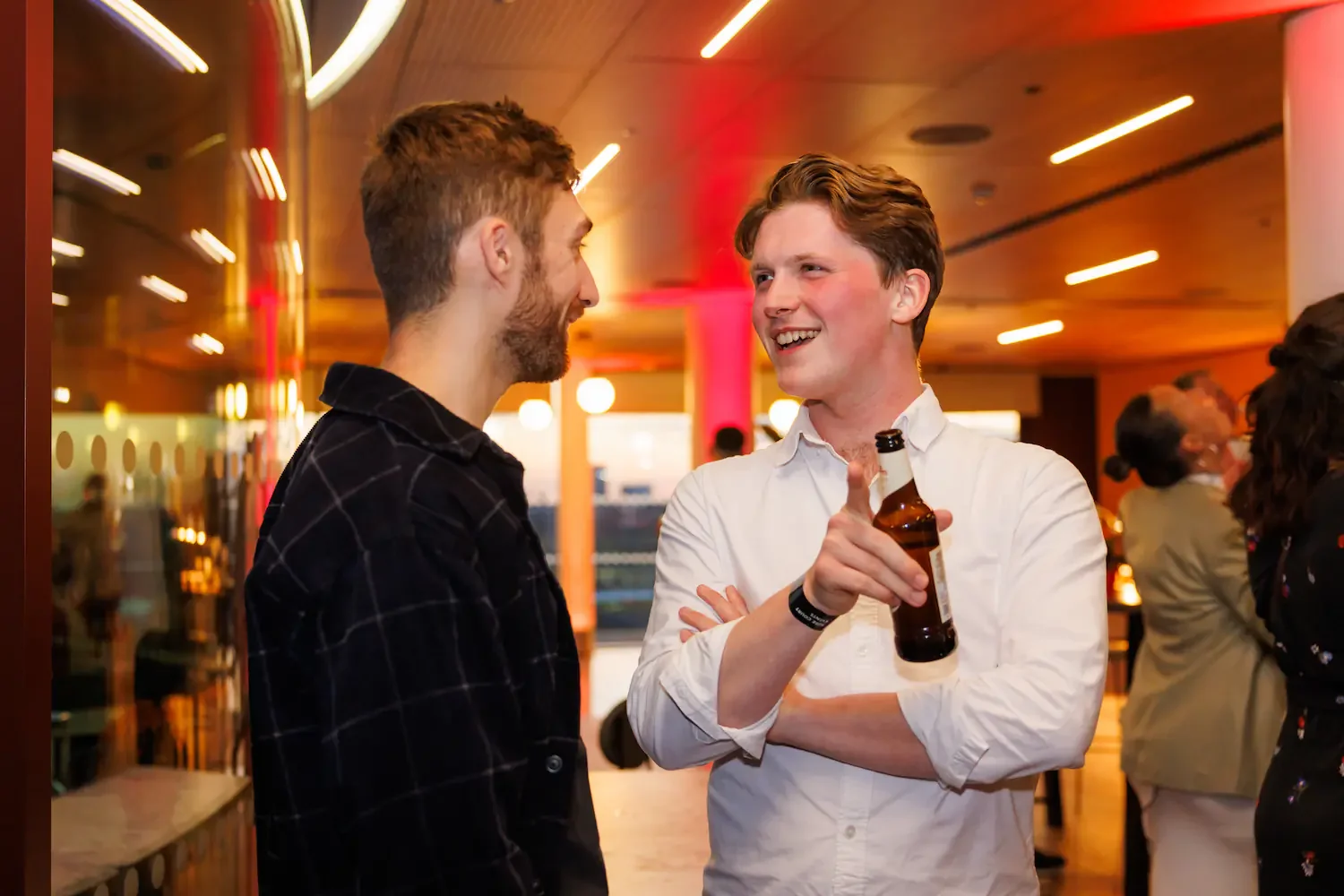 Staff mingling during a corporate summer party