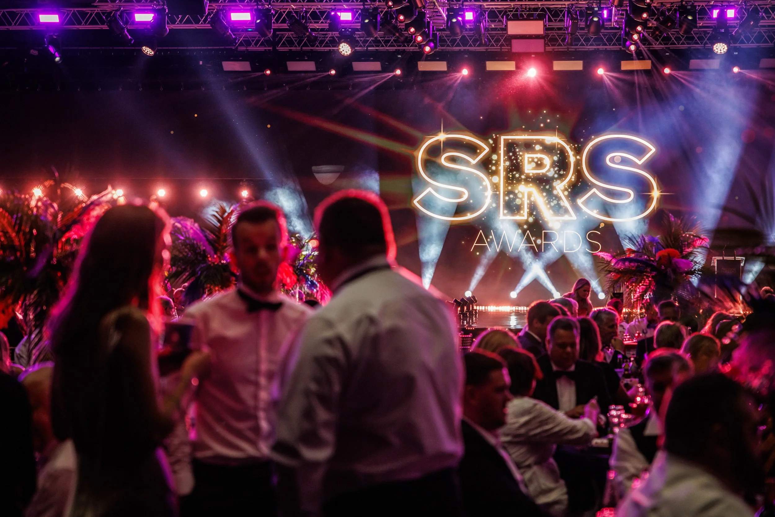 SRS Awards reception with branded stage and guests