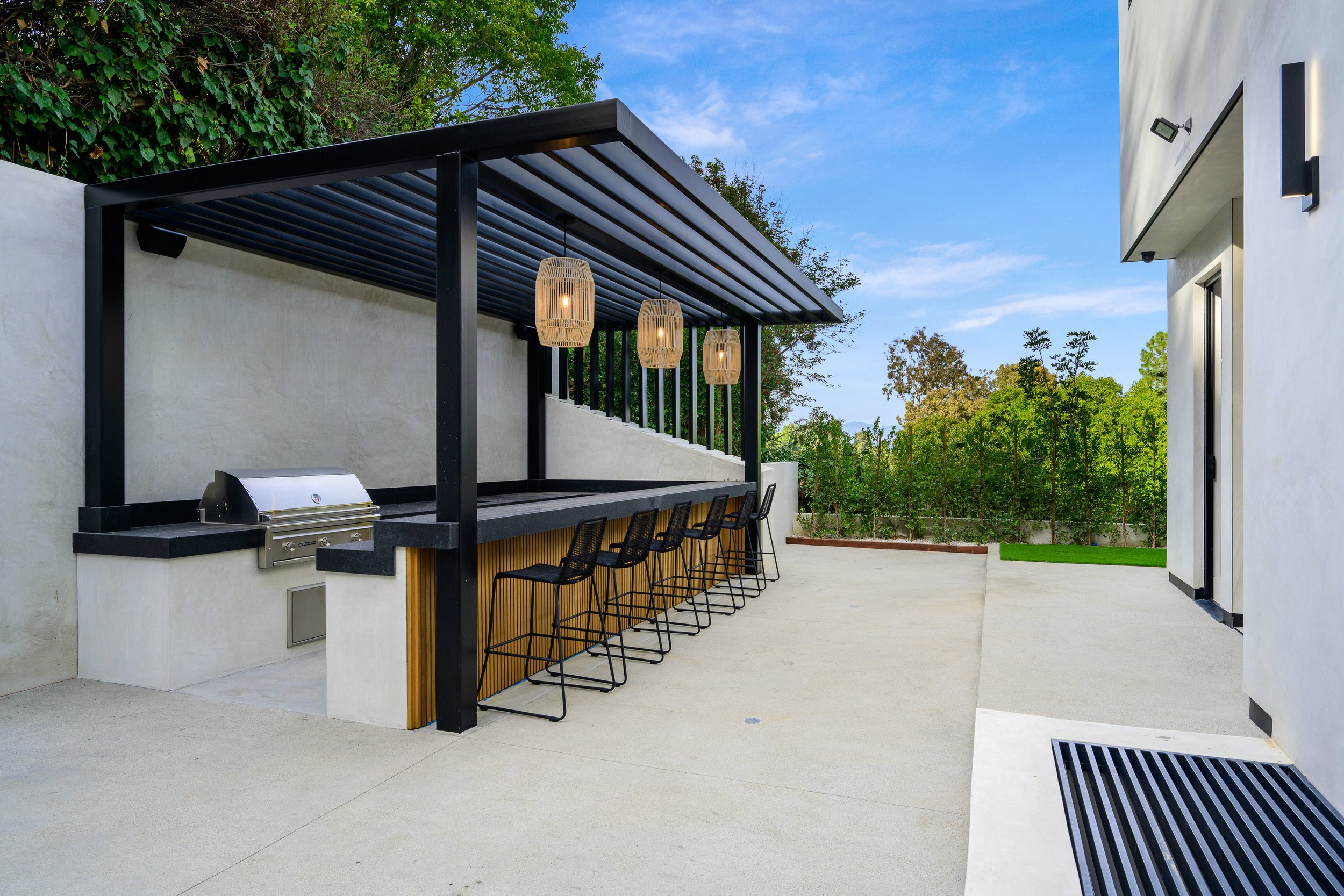 scenic-view-of-an-outdoor-patio-surrounded-by-tree-2025-02-02-07-11-28-utc.jpg