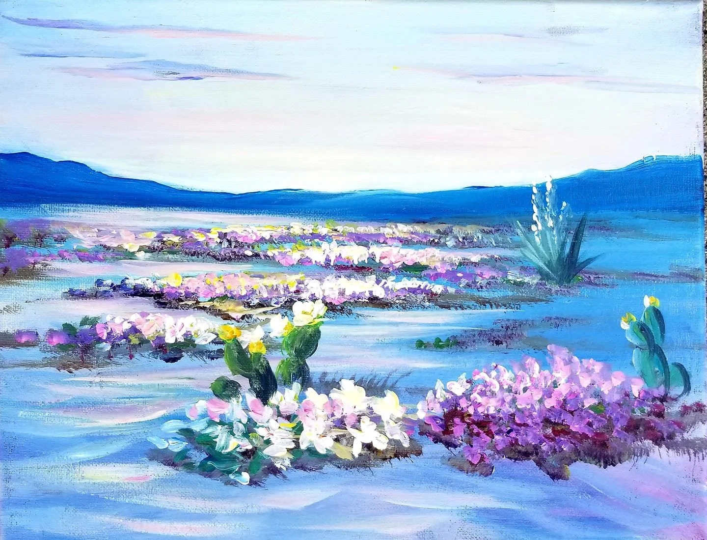 A landscape painting depicting a desert scene with pink and purple flowers, cacti, and blue mountains under a pale sky.