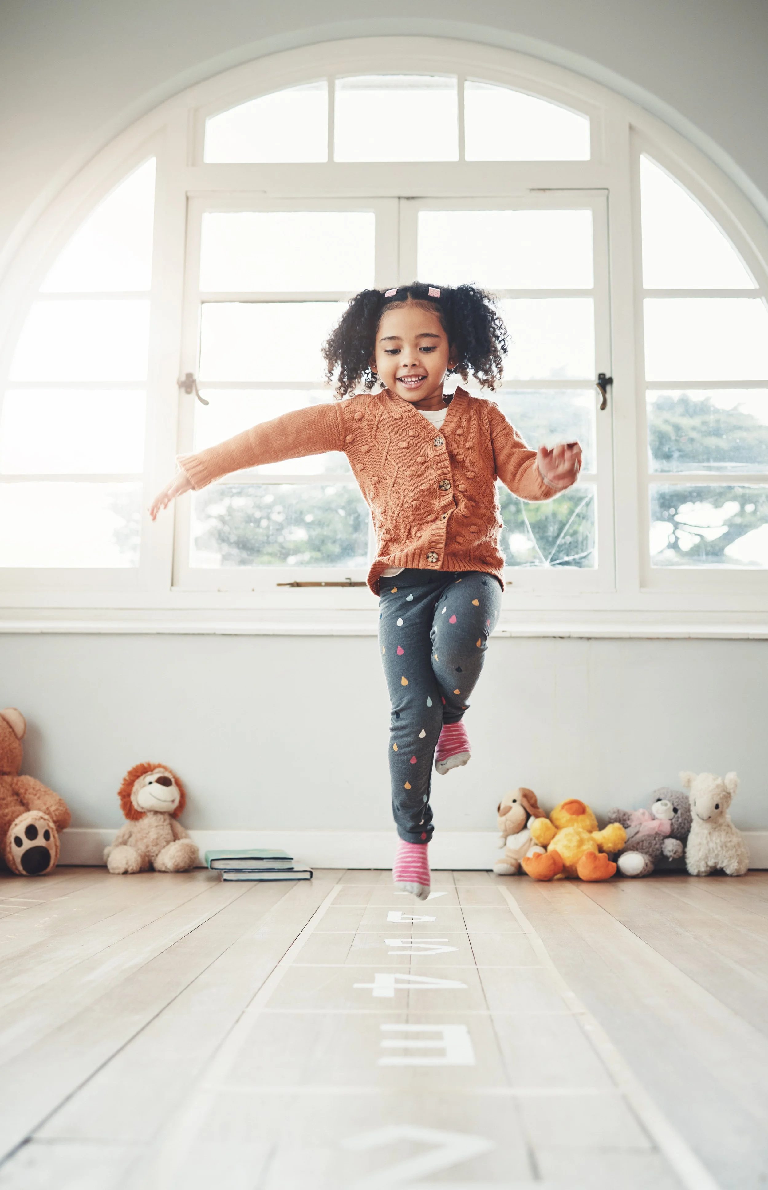 hopscotch-happy-girl-play-home-having-fun-enjoying-games-relax-bedroom-childhood-kindergarten-excited-child-balance-jumping-game-playing-entertainment-activity-floor.jpg