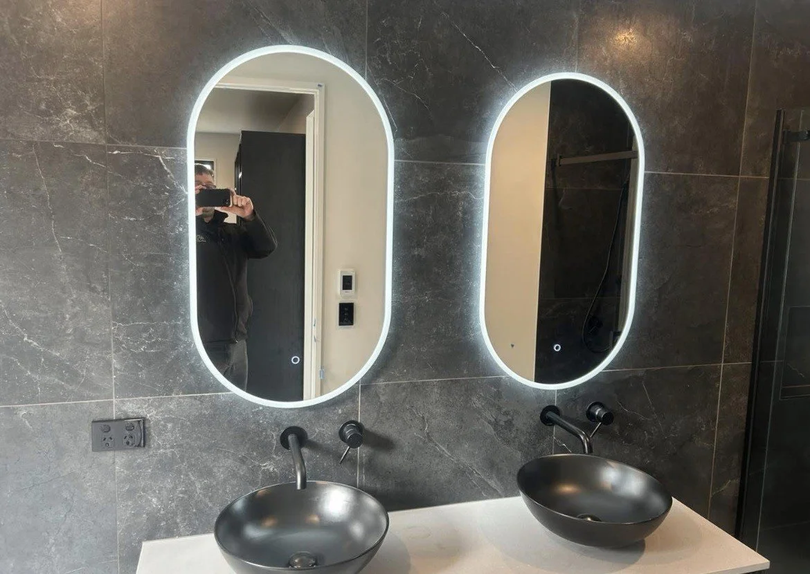 Backlit LED bathroom mirrors wired by Shox Electrical