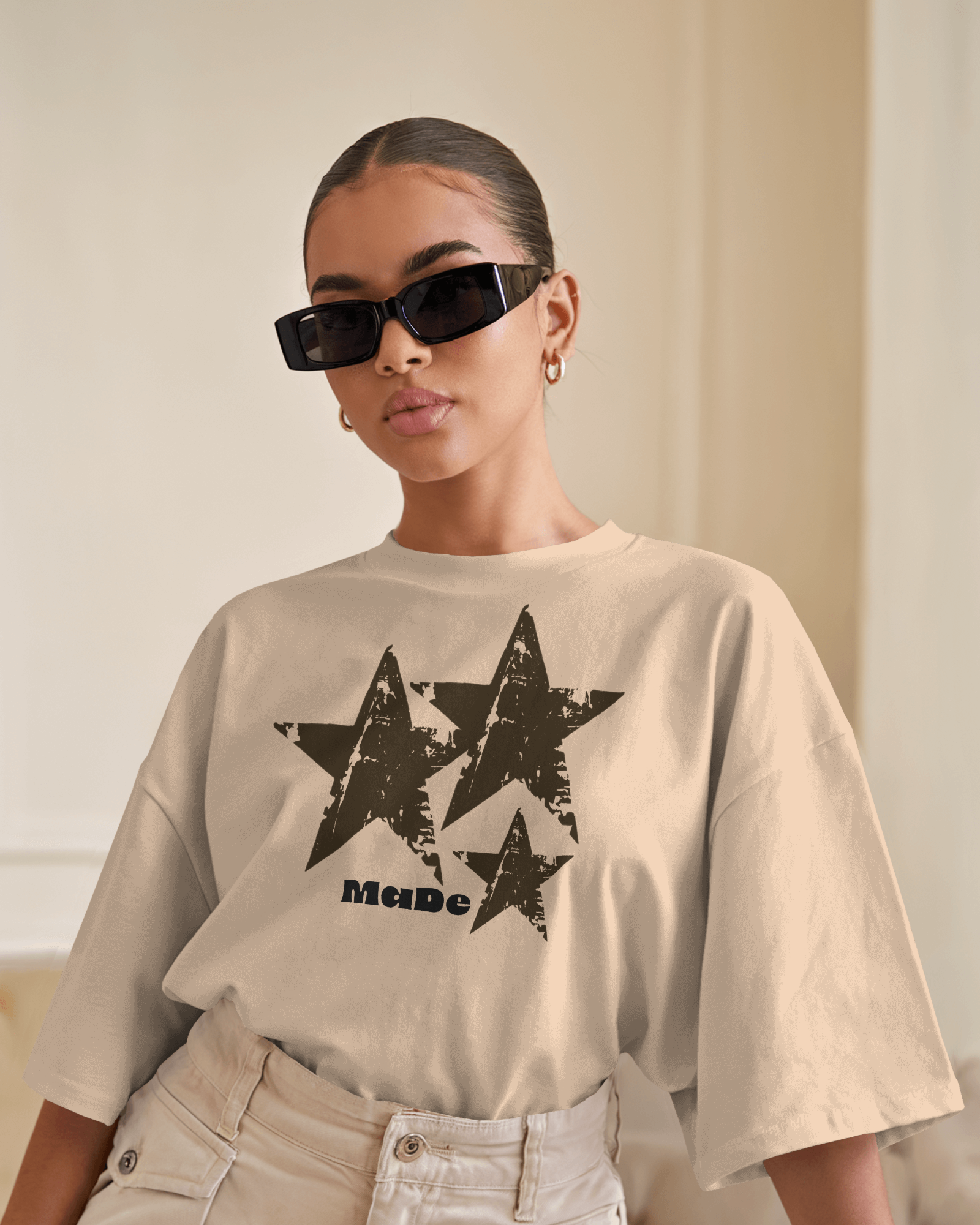 luxury-interior-t-shirt-mockup-female-model-with-sunglasses-in-minimalist-background-0547 (1).png