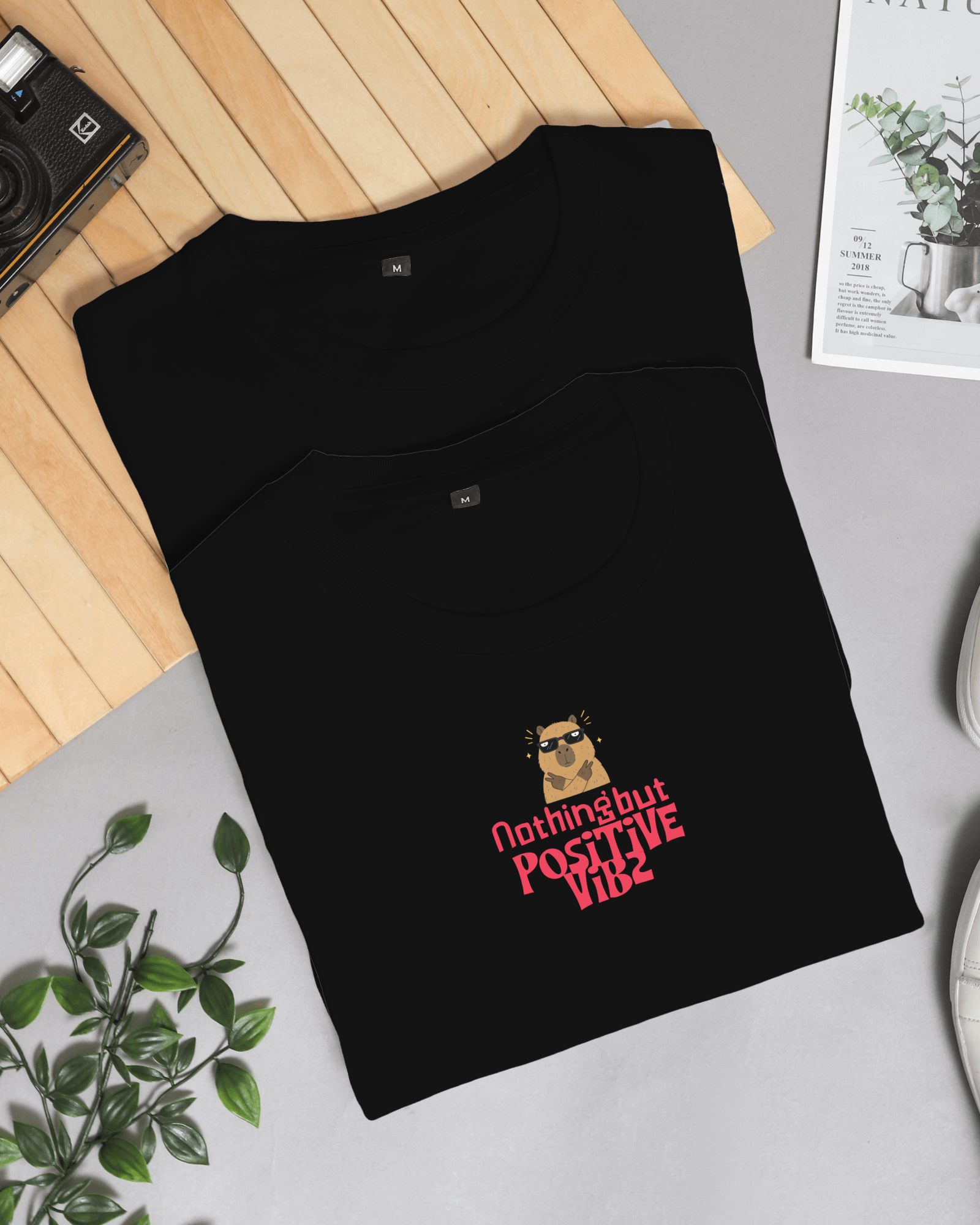 two-unisex-folded-tshirt-mockups-0037.png