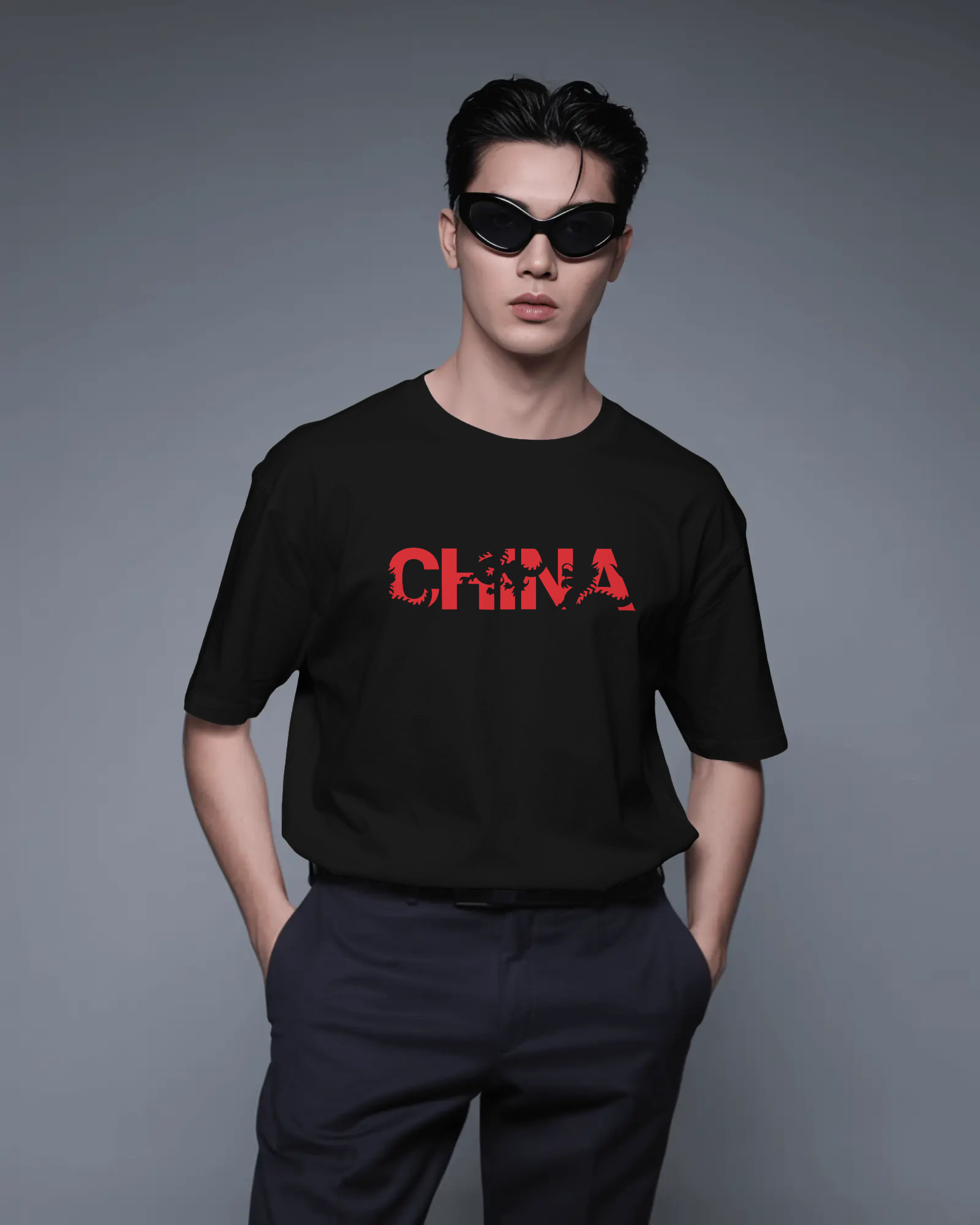 modern-front-facing-t-shirt-mockup-with-model-standing-relaxed-in-studio-grey-gradient-backdrop-03705.png