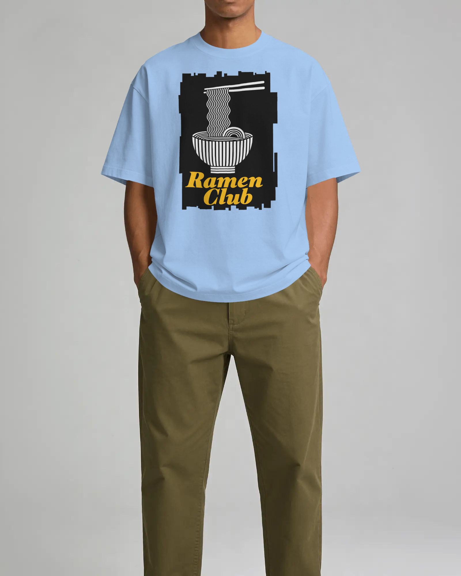 printful-tshirt-mockup-male-model-standing-front-view-with-hands-in-pockets-against-minimal-studio-04064.png