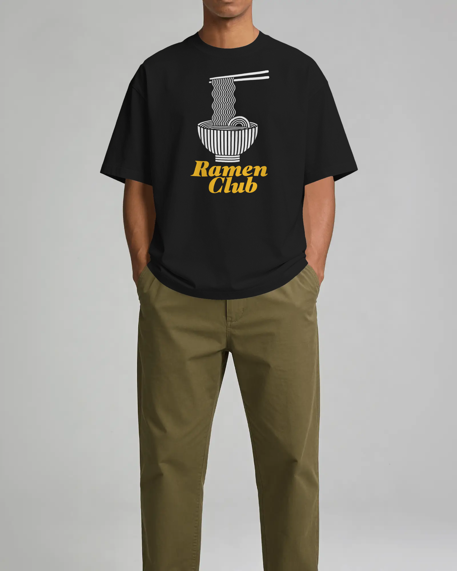 printful-tshirt-mockup-male-model-standing-front-view-with-hands-in-pockets-against-minimal-studio-04064 (1).png