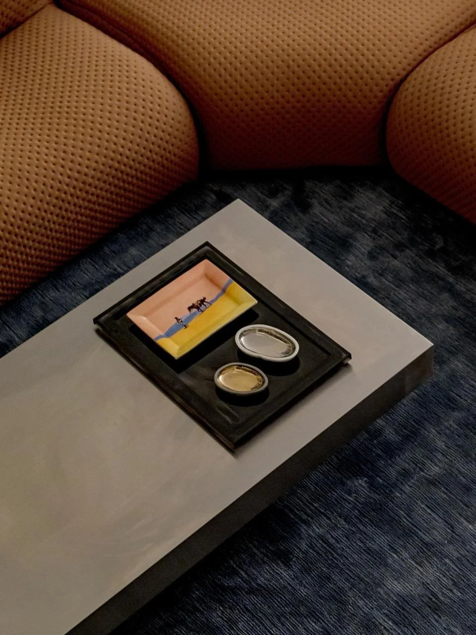 MATERIALITY. &lsquo;&rsquo;Polished stone underfoot, linen curtains
pooled at the floor, timber cabinetry rising to the ceiling, grass cloth on the walls and a velvet
chair tucked in the corner. All neutral, all quiet, but layered enough to feel like