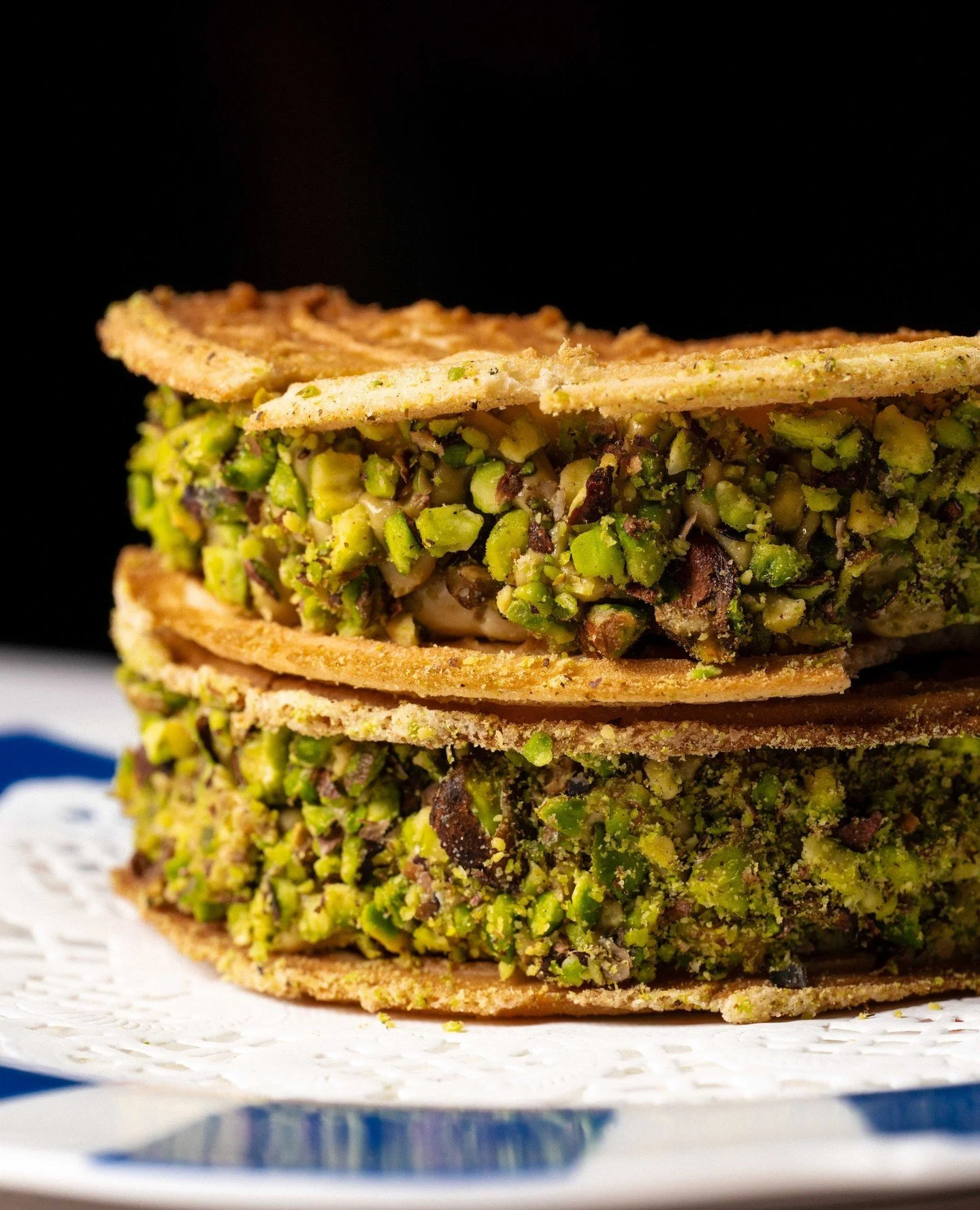 Our Gelato Sandwich is a silky pistachio parfait tucked between two crisp, house-made pizzelle - the perfect sweet finish.⁠
⁠
#RonniesMelbourne #MelbourneCBD #ItalianDessert #GelatoSandwich #Pistachio #Pizzelle #MelbourneEats #MelbourneFoodie #Rialto
