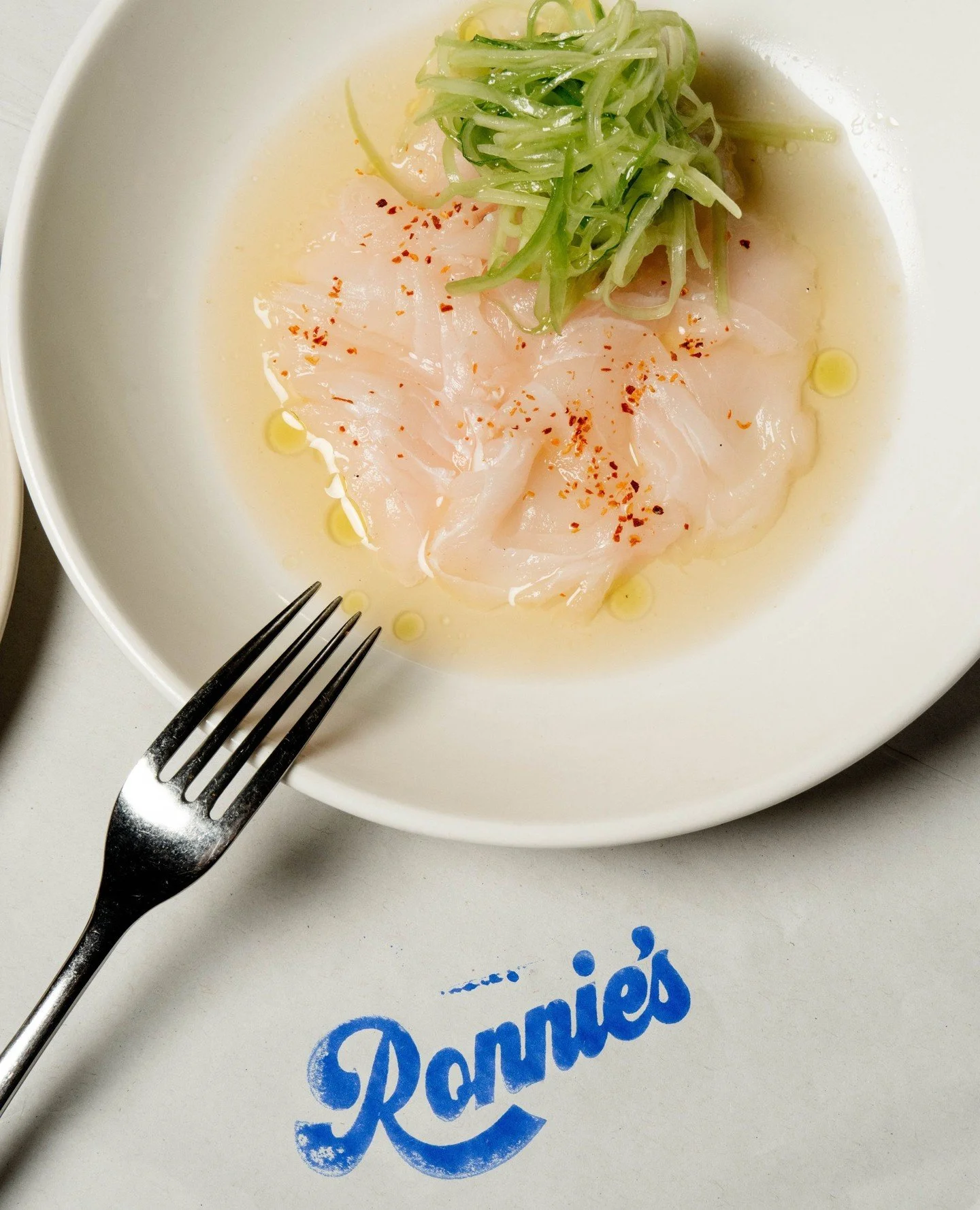 Crudo &mdash; white fish with tomato consomm&eacute;, cucumber and basil.⁠
⁠
#RonniesMelbourne #Crudo #MelbourneSeafood #MelbourneRestaurants #ItalianFood