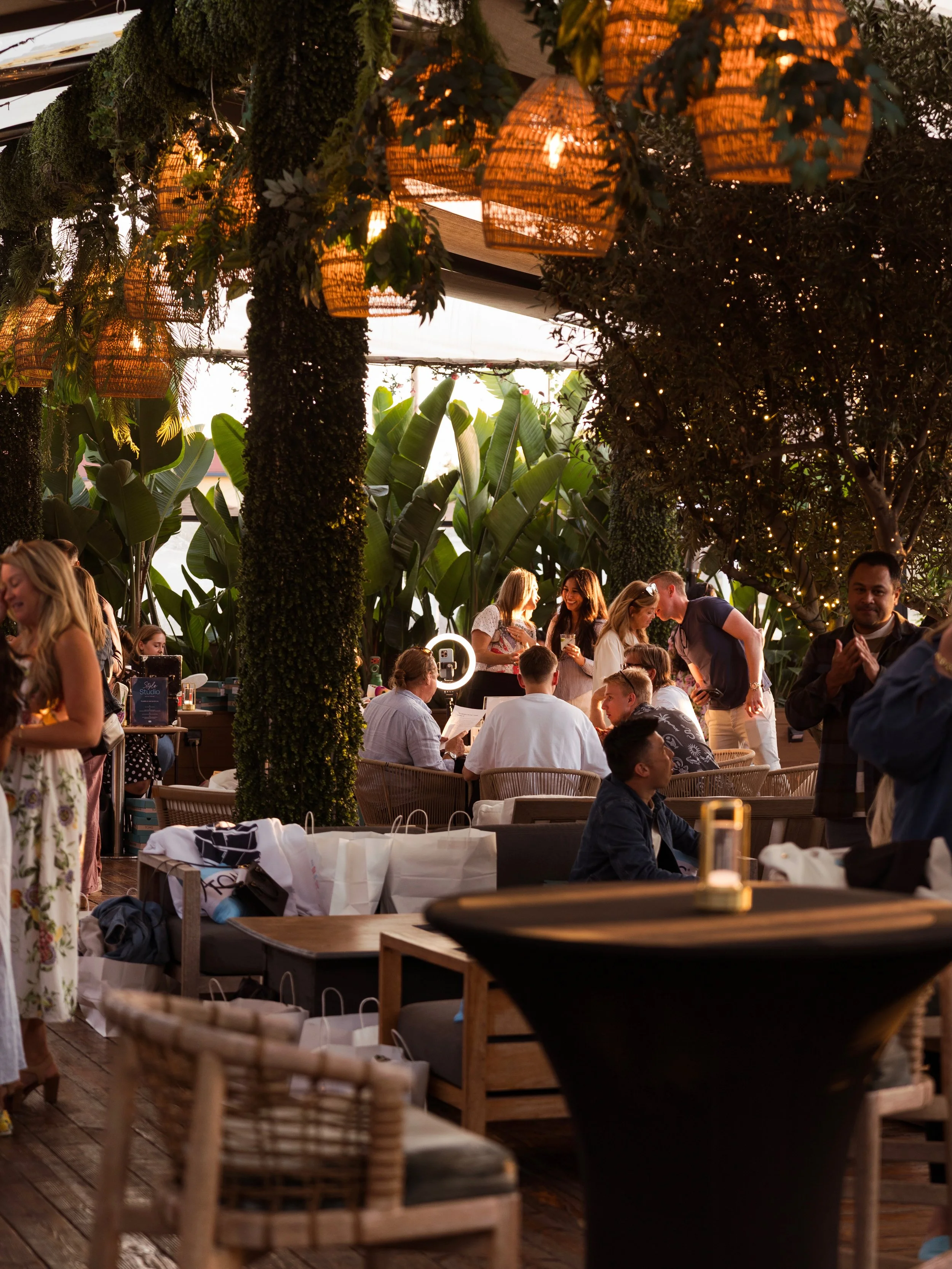 Guests mingle, dine, and capture memories during a private corporate event at Paloma Venice, the ideal venue for holiday parties, networking events, and team celebrations. (