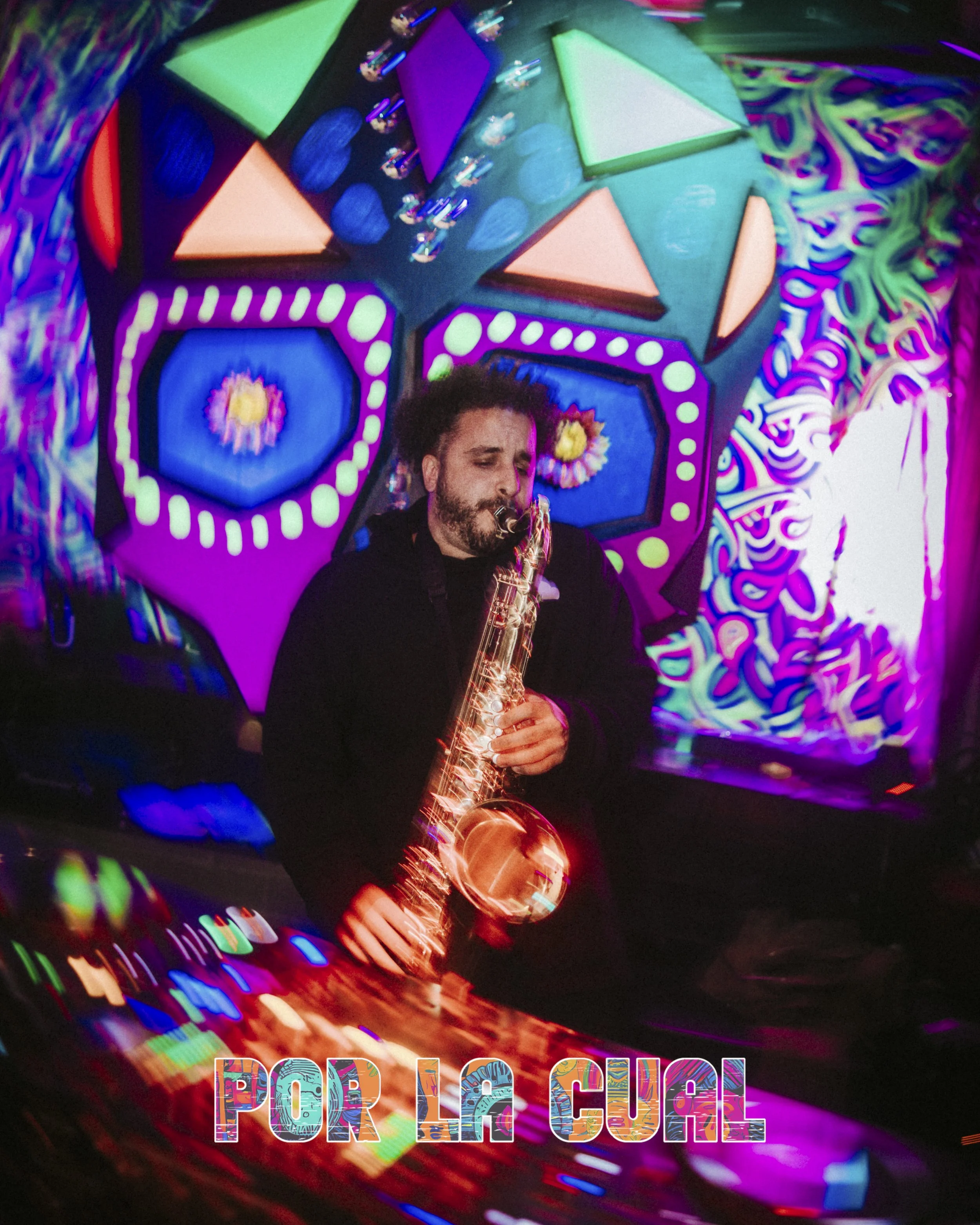 A man playing a saxophone at a vibrant, psychedelic art background with colorful neon lights and a pixelated skull design.