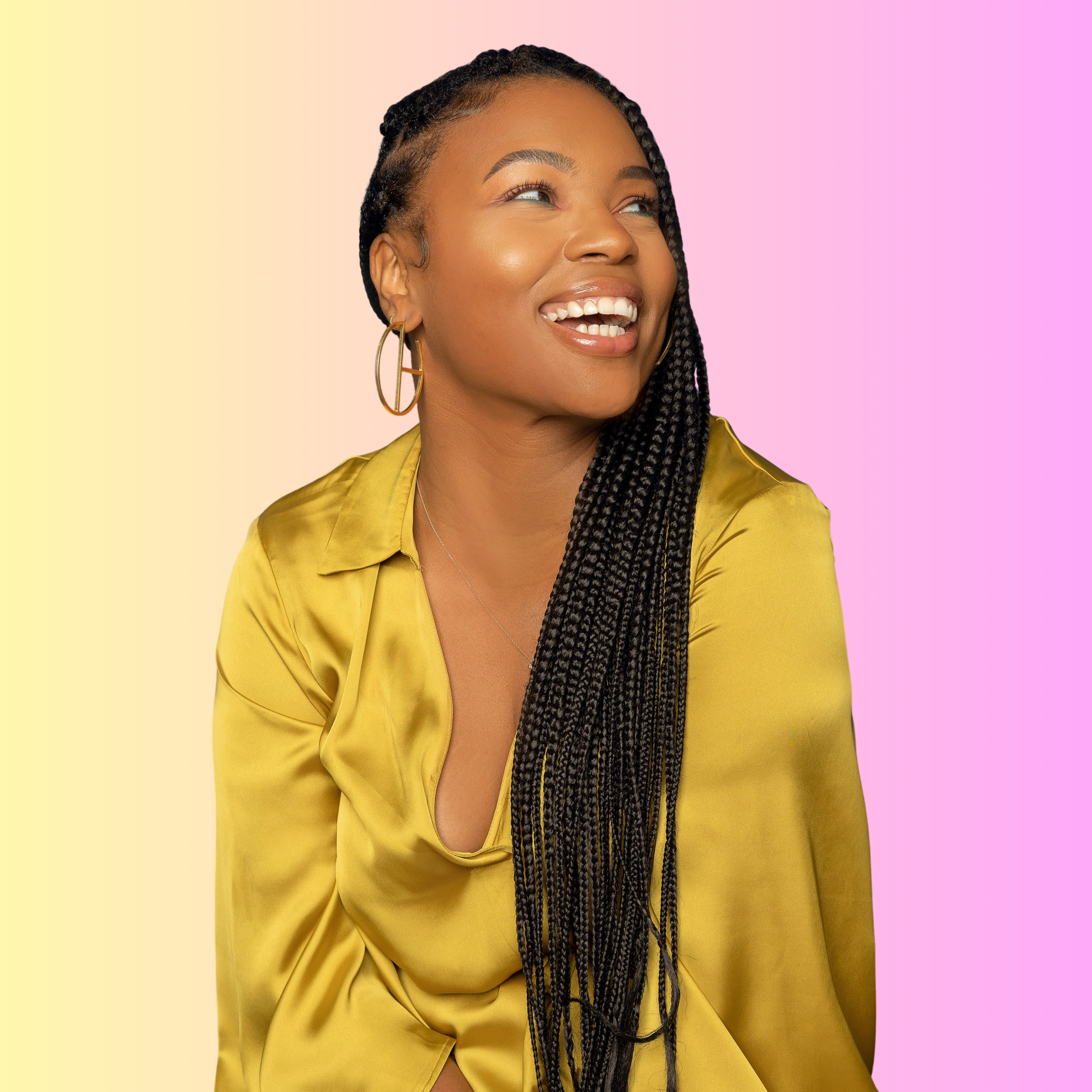 A smiling woman with long black braided hair wearing gold earrings and a yellow satin blouse against a colorful pastel background.
