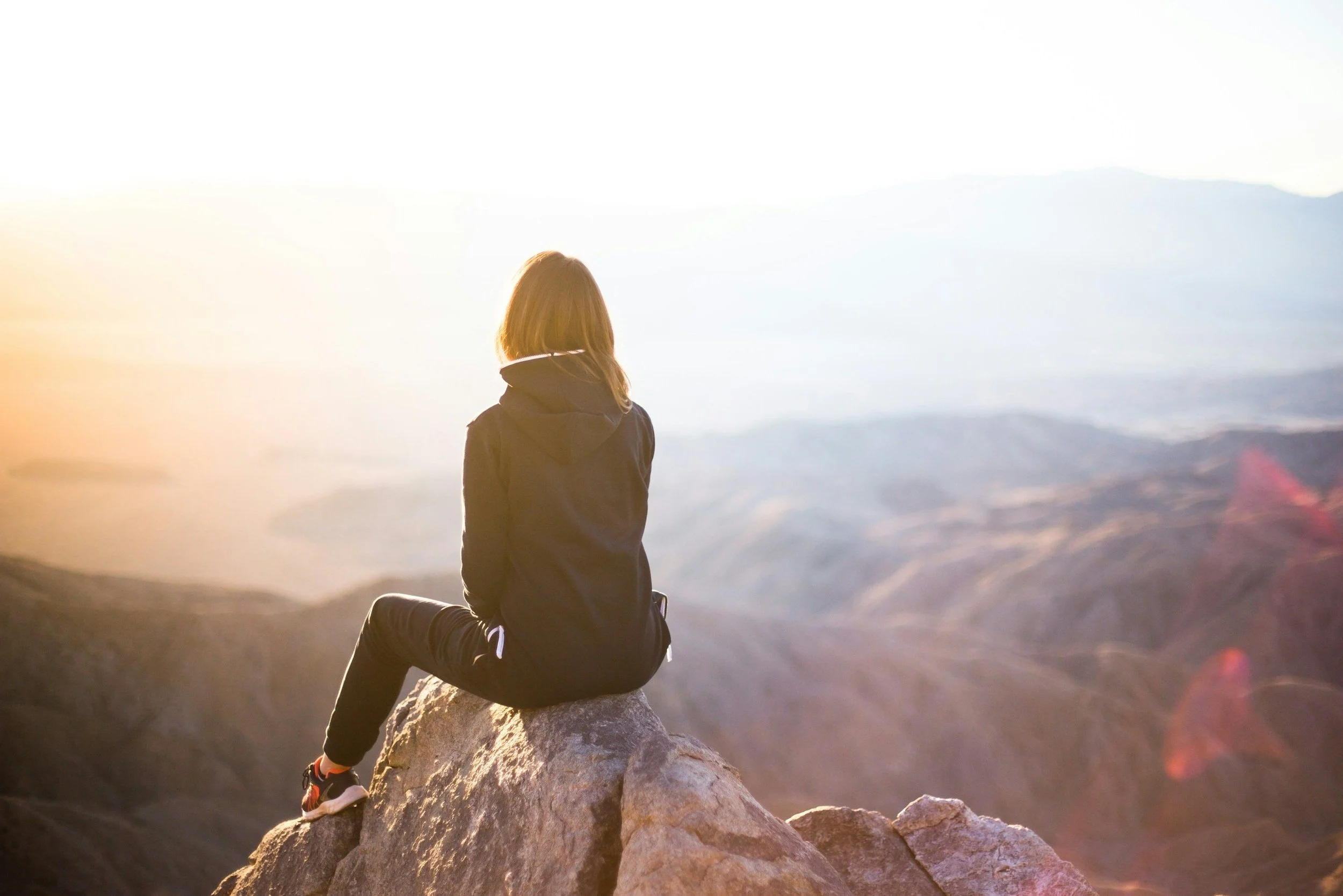 Lady looking over mountains
