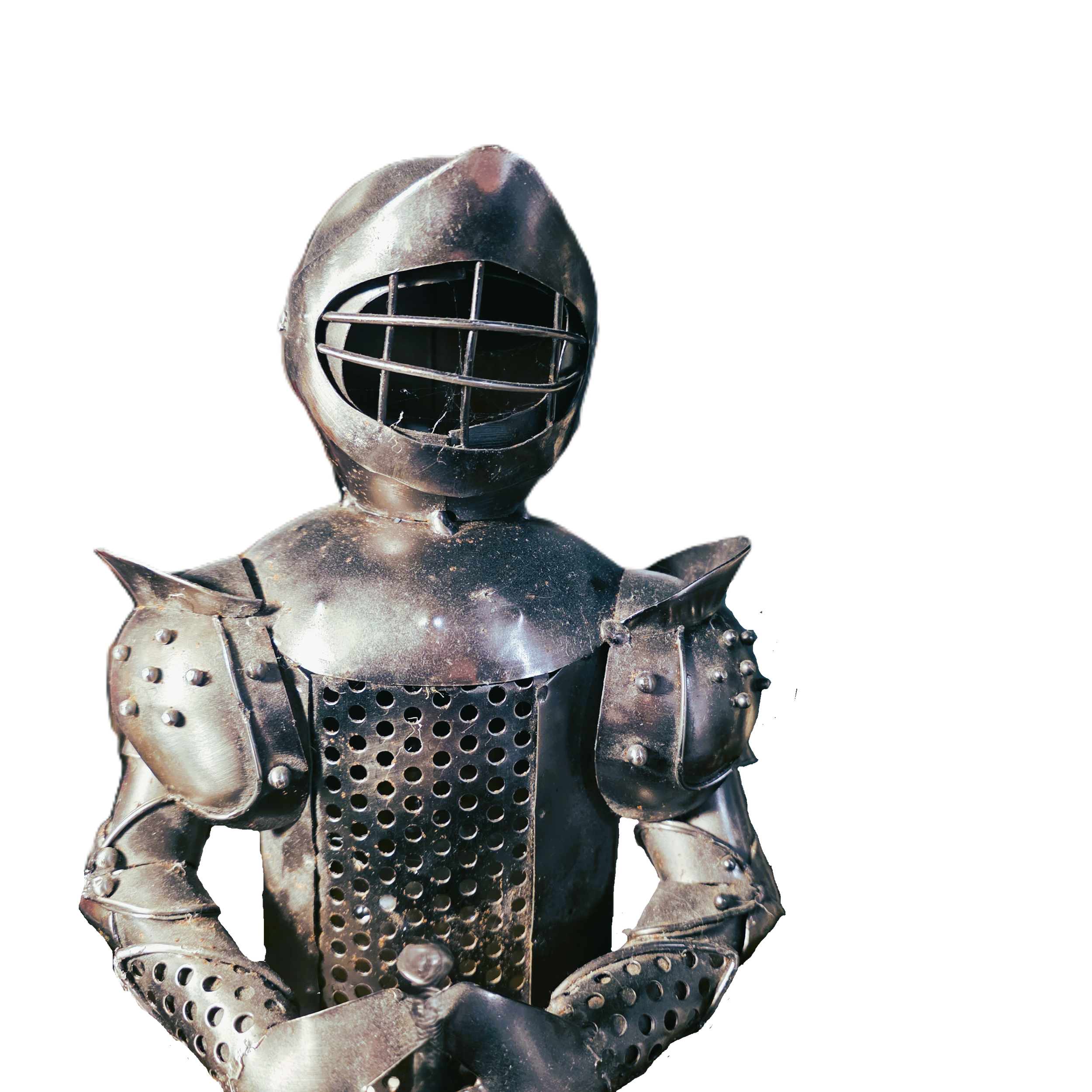 A suit of medieval armour with a grid-like faceplate and perforated chest, posing with crossed arms.