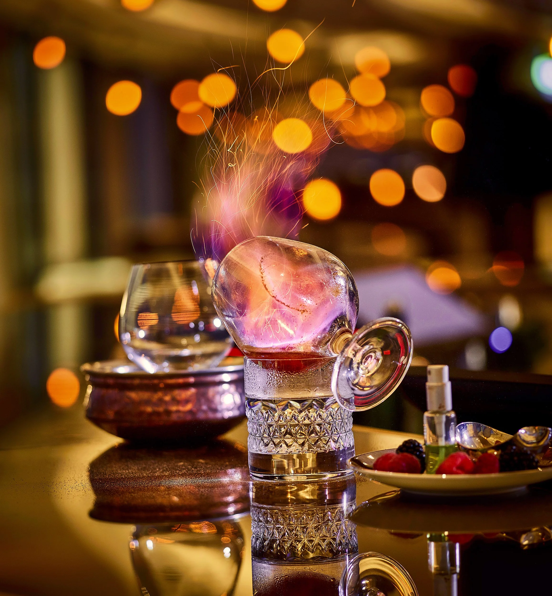 Charles also photographs drinks and this particular photographed called for precise teamwork between the barman, stylist and photographer to achieve this stunning image of the flaming brandy an a balloon glass.