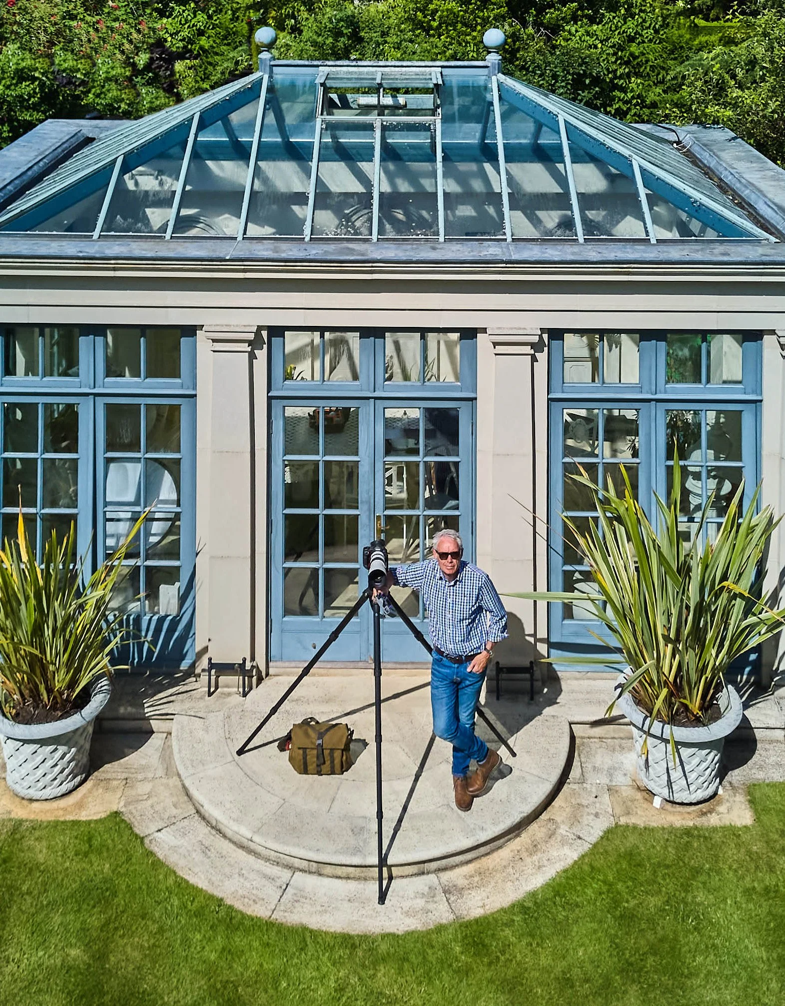 A drone selfie of Charles Ward working on location at Haddonstone in Northamptonshire, photographing one of their beutiful orangeries.