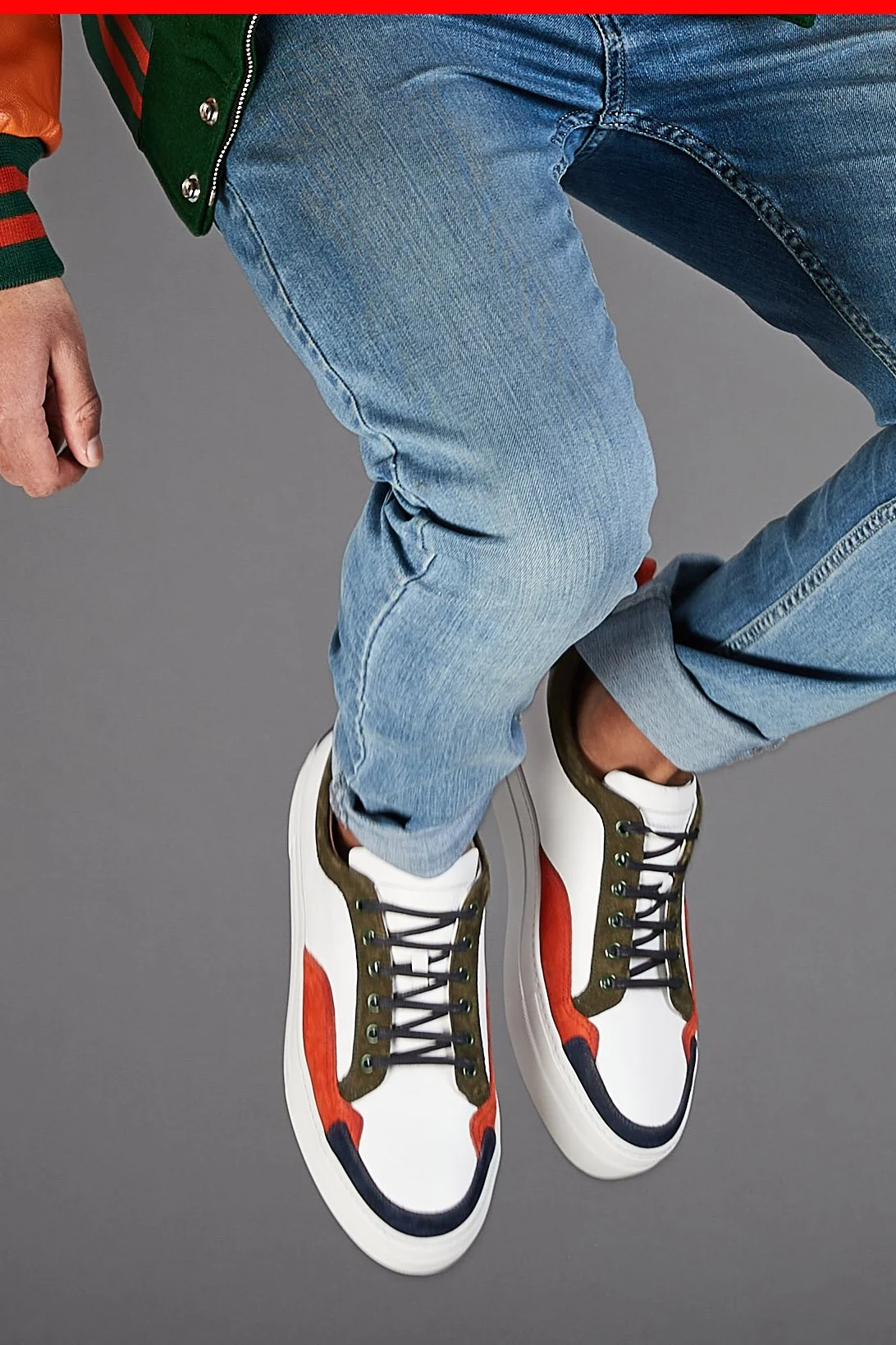 Charles has been photographing shoes for over 40 years, from beautiful welted brogues to Doc Martens. This photograph shows a pair of modern trainers fro a new startup.