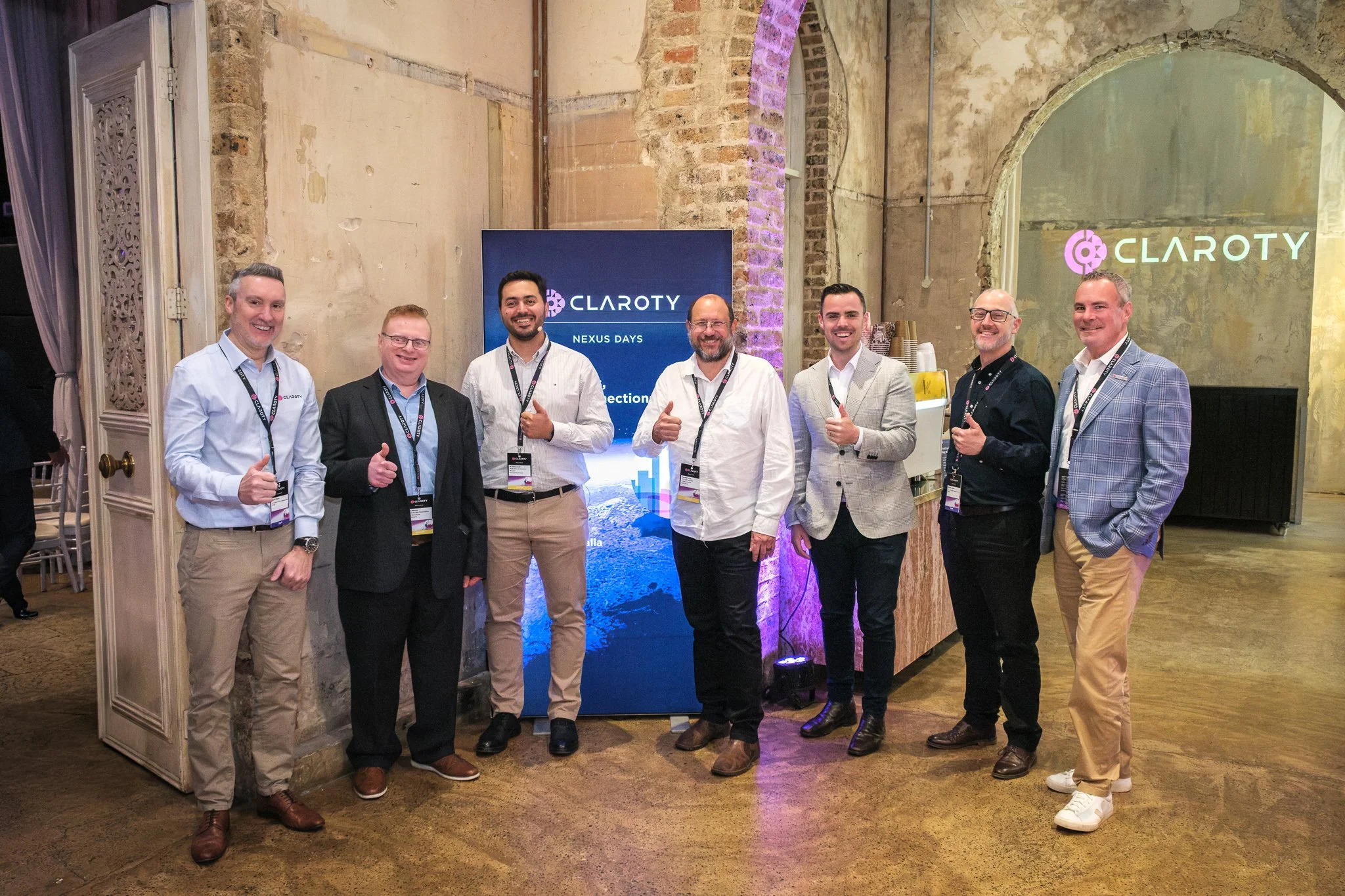 Corporate event photographer Sydney — team group shot at corporate conference Sydney