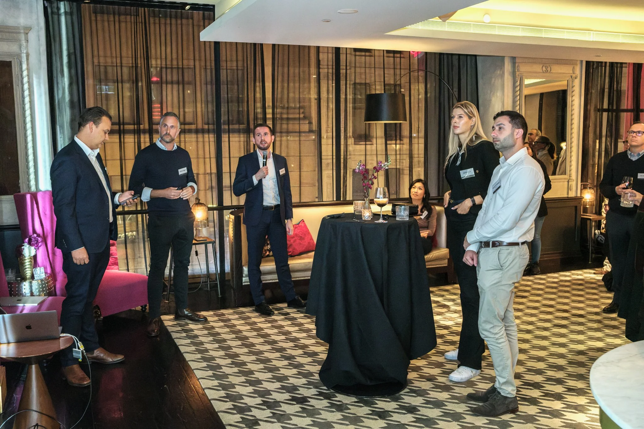 Corporate event photography Sydney — JLL speaker addressing networking guests