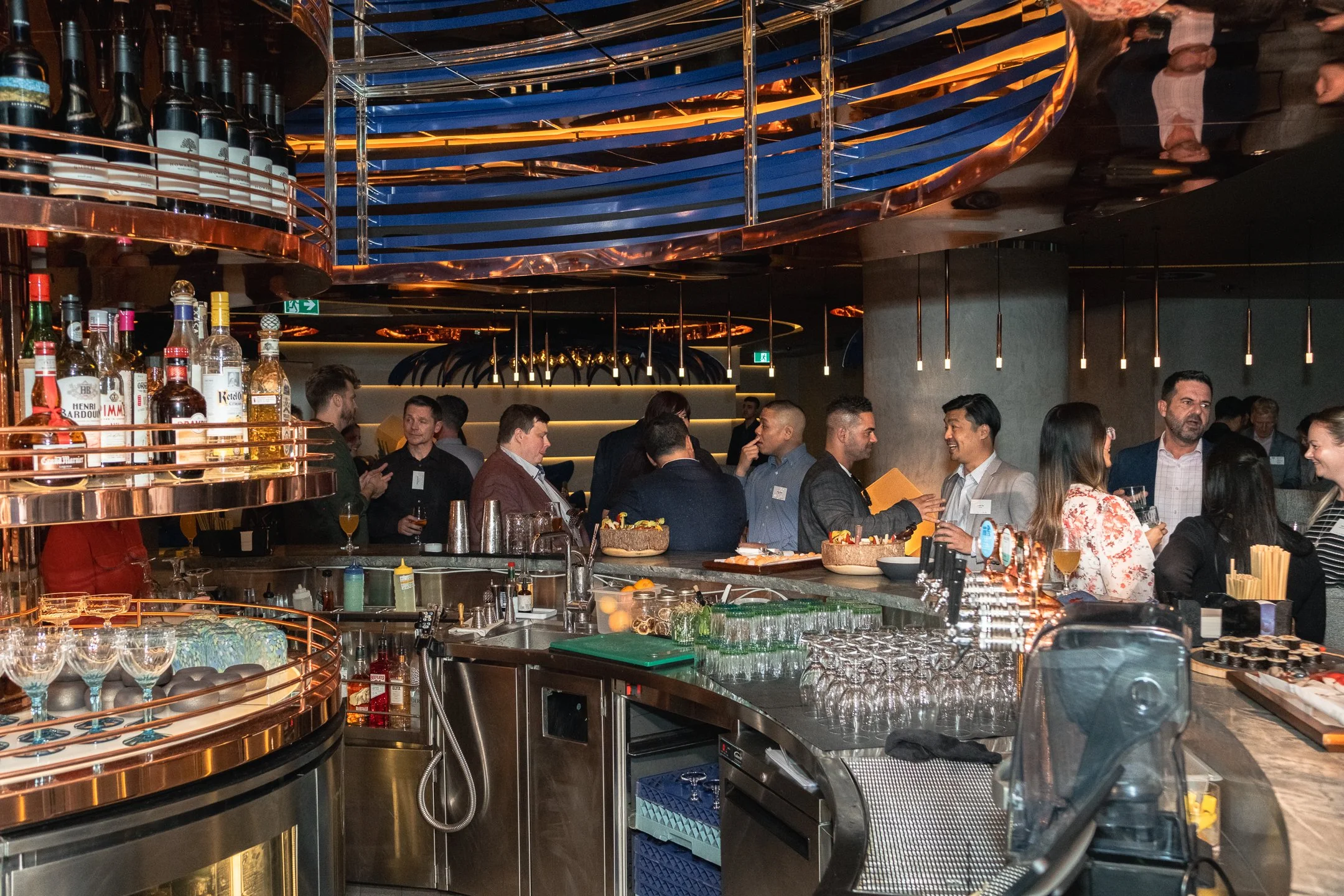 Guests chatting at W Hotel Sydney during corporate networking event