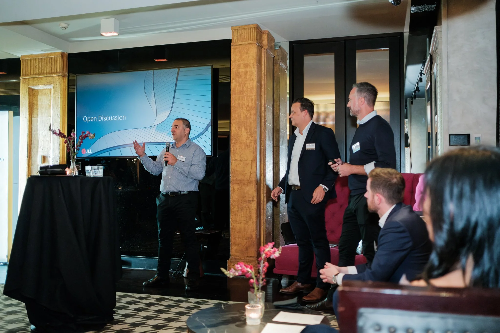 The wide room shot — every event needs at least two or three of these. They communicate scale and energy in a single frame, and they're one of the first images used in post-event press.