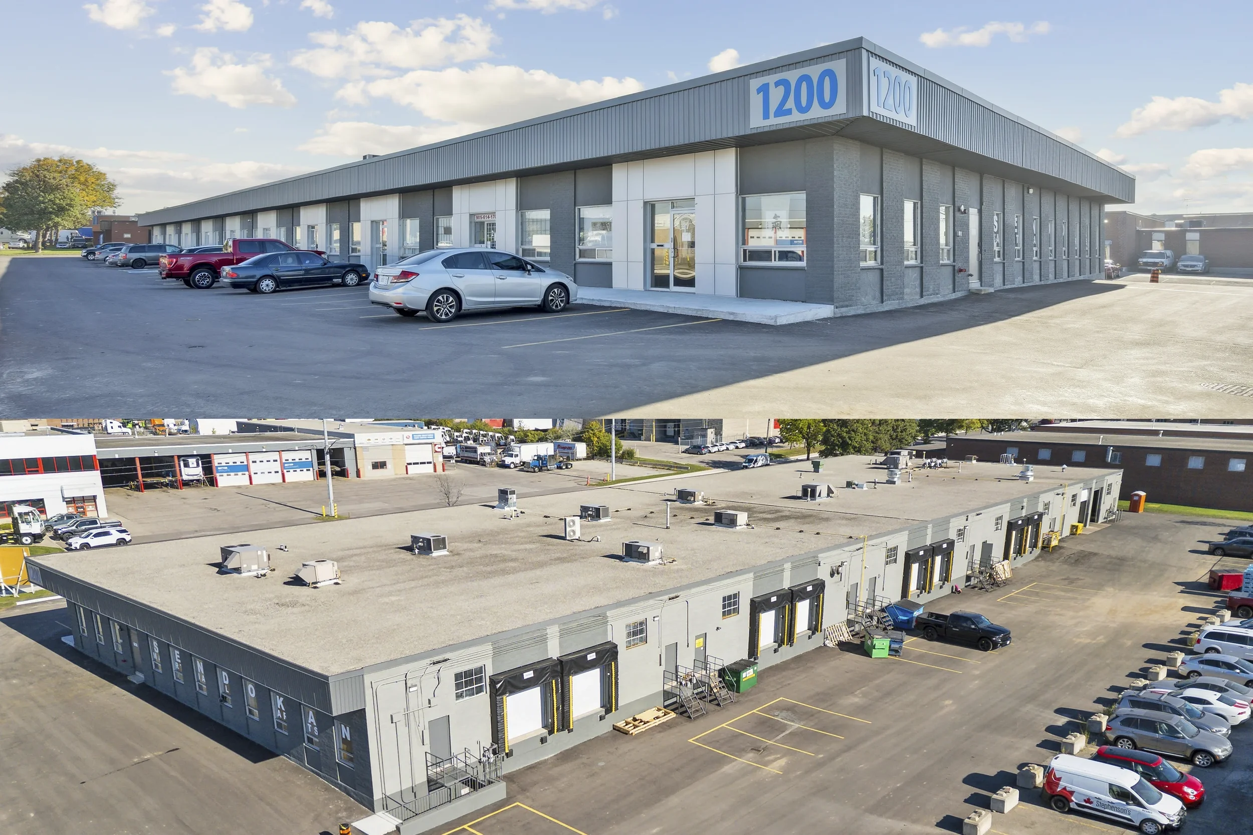 Exterior view of a commercial building with blue signage showing the number 1200, parked cars in front, and a flat roof. Behind it are other industrial buildings with parking lots and loading docks.