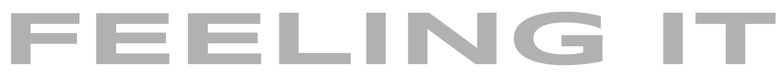 "Feeling It" text in gray, uppercase letters on a white background.
