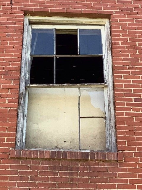 Restored six-lite historic wood sash from the Martindale Motor Corporation Building