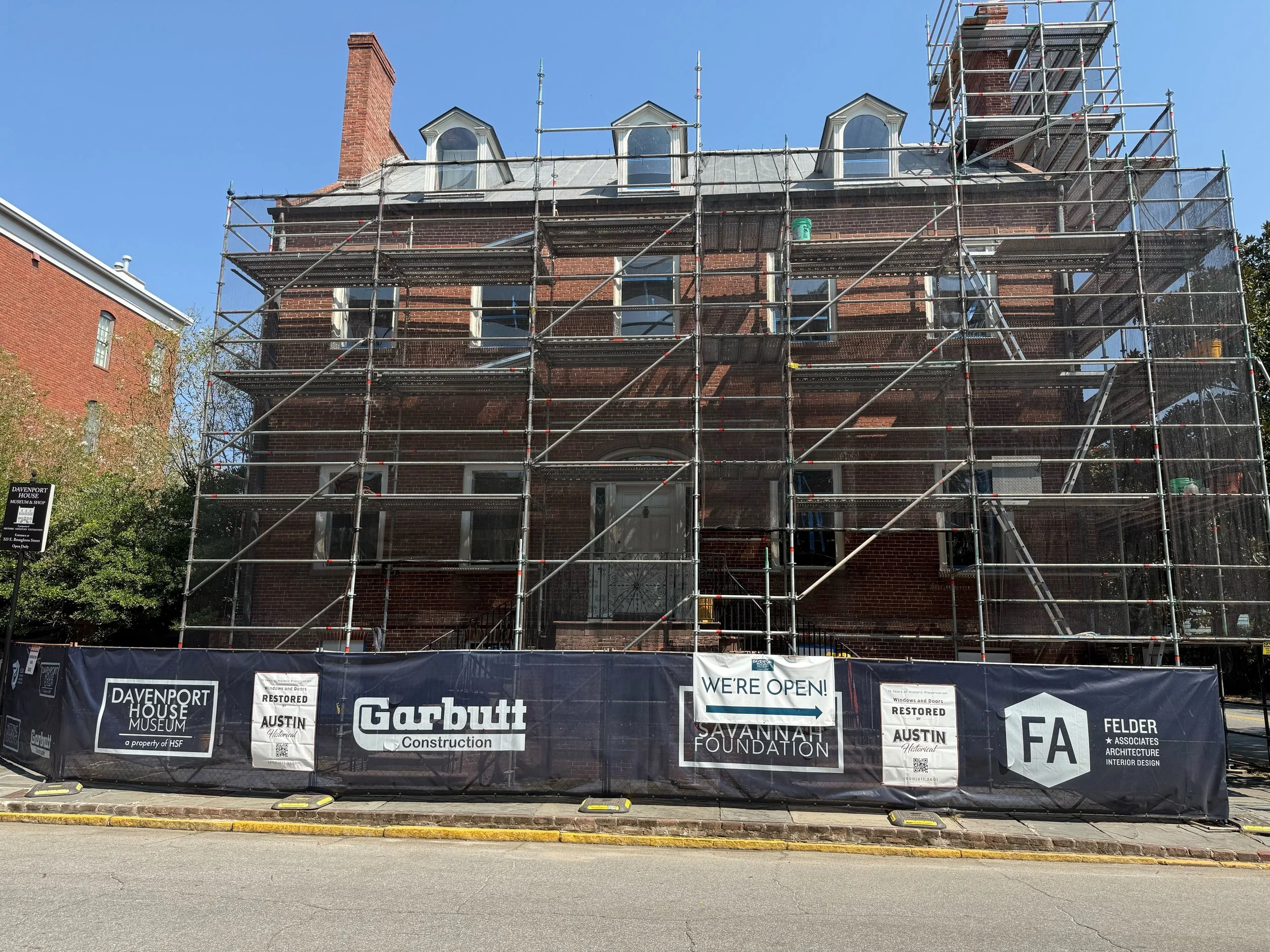 The Davenport House Museum Savannah GA with scaffolding historic window restoration