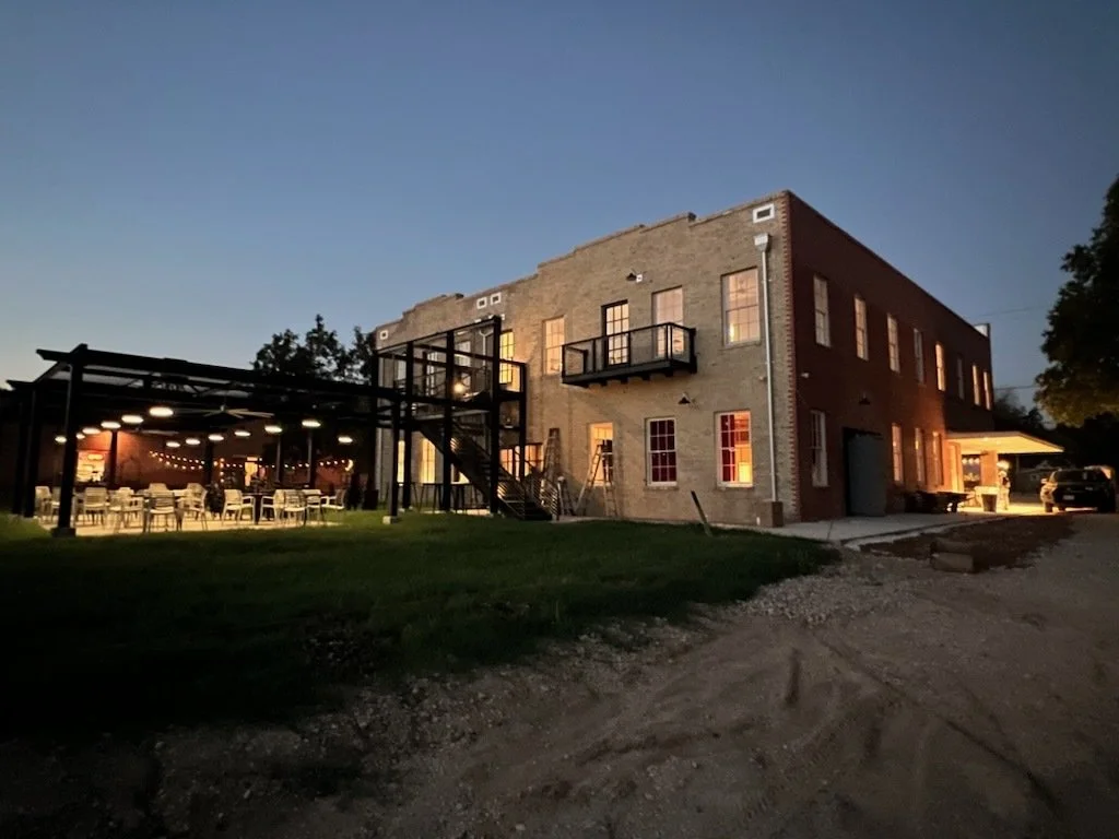 Six-lite double-hung wood windows on the restored Martindale Motor Corporation Building