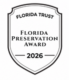 Florida Trust Florida Preservation Award 2026. A black outline of a shield with a blank center, resembling a crest or emblem.