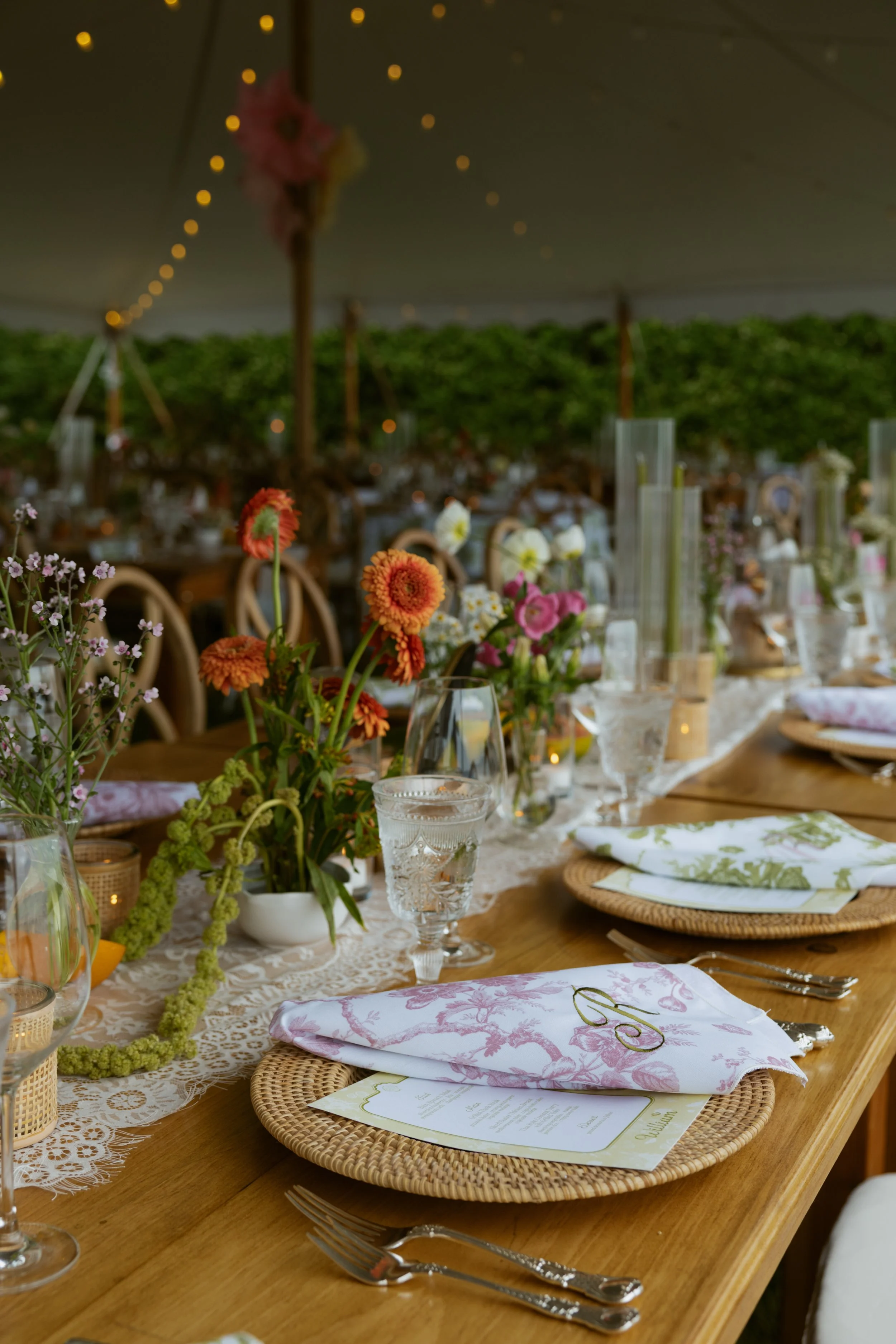 Whimsical maximalist wedding table setting with bright colors and butterflies bespoke details from posh wedding in Newport Rhode Island. Photos taken by cincinnati wedding photographer specializing in destination weddings