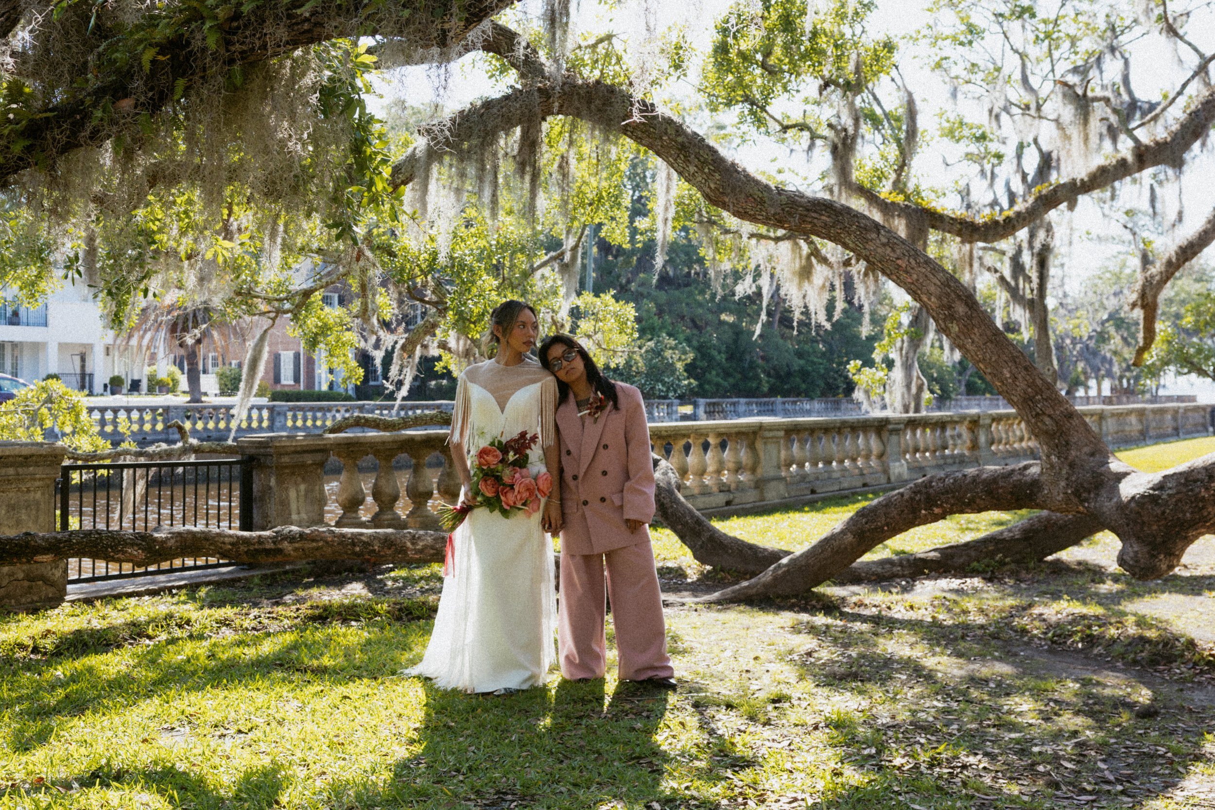 lesbian couple takes wedding photos in beautiful northern Jacksonville park