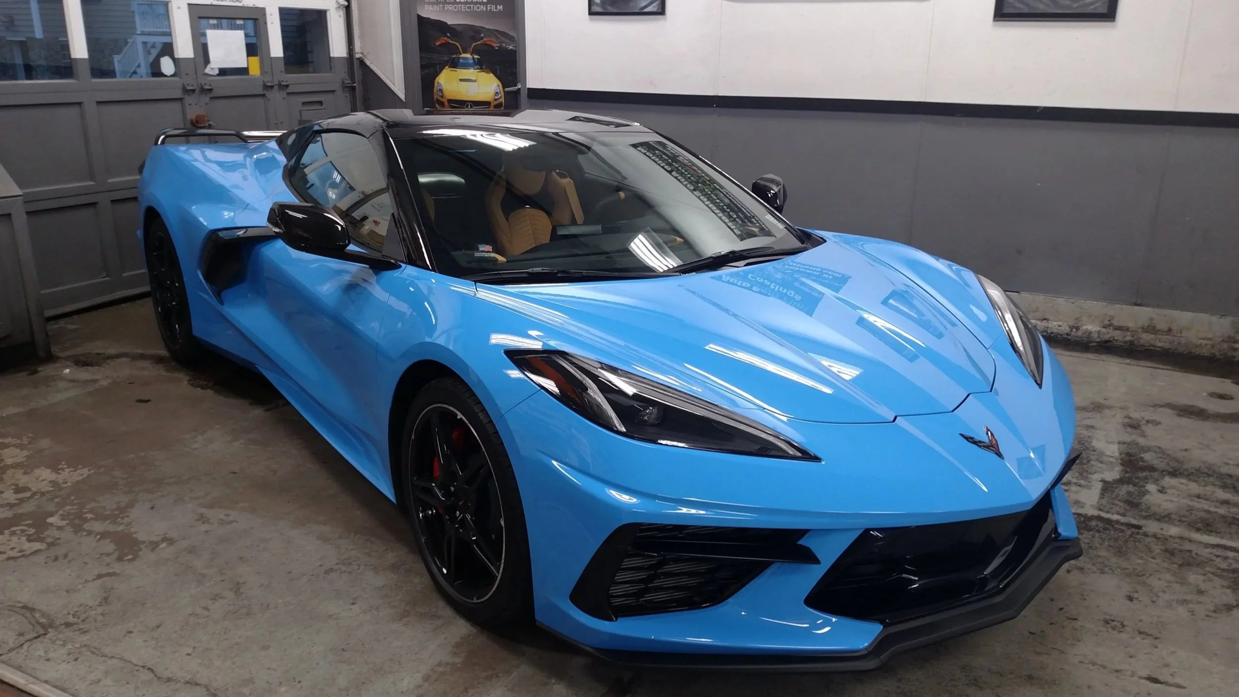 A blue Chevrolet Corvette Wrapped from head to toe in XPEL Ultimate Plus PPF