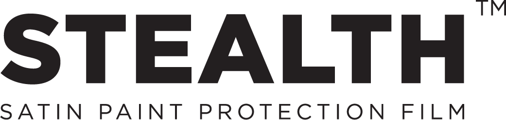 Close-up of the Stealth satin paint protection film logo with text in black and dark gray.