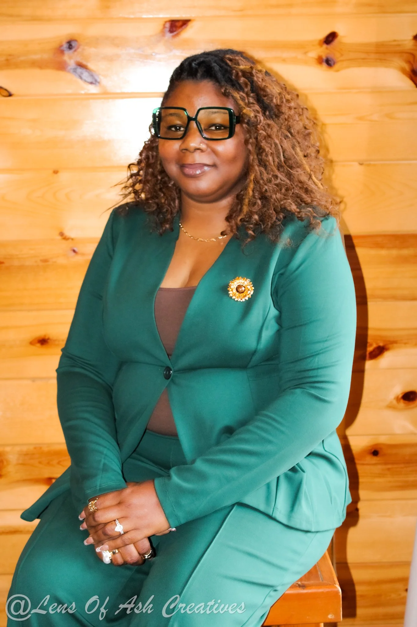 Close-up of a barn owl's face with striking eyes and detailed feather patterns.