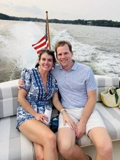 A couple celebrating their 40th birthdays with a private daytime charter with Chesapeake Classic Yacht Charters.