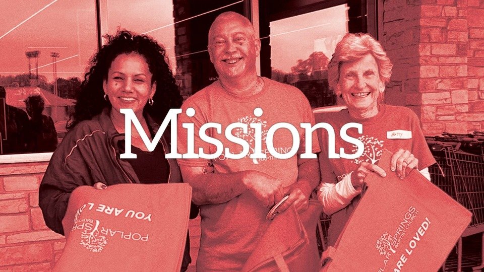 Three smiling people holding shopping bags in front of a brick building, with the word 'Missions' overlayed.