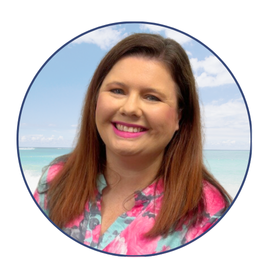 Professional headshot of Emily Baney, loan officer at the SRCFCU Milton Branch, smiling in front of a soft beach background.