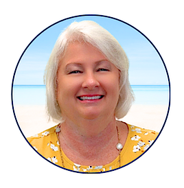 Professional headshot of Ladonna Woodard, loan officer at the SRCFCU Pace Branch, smiling in front of a soft beach background.