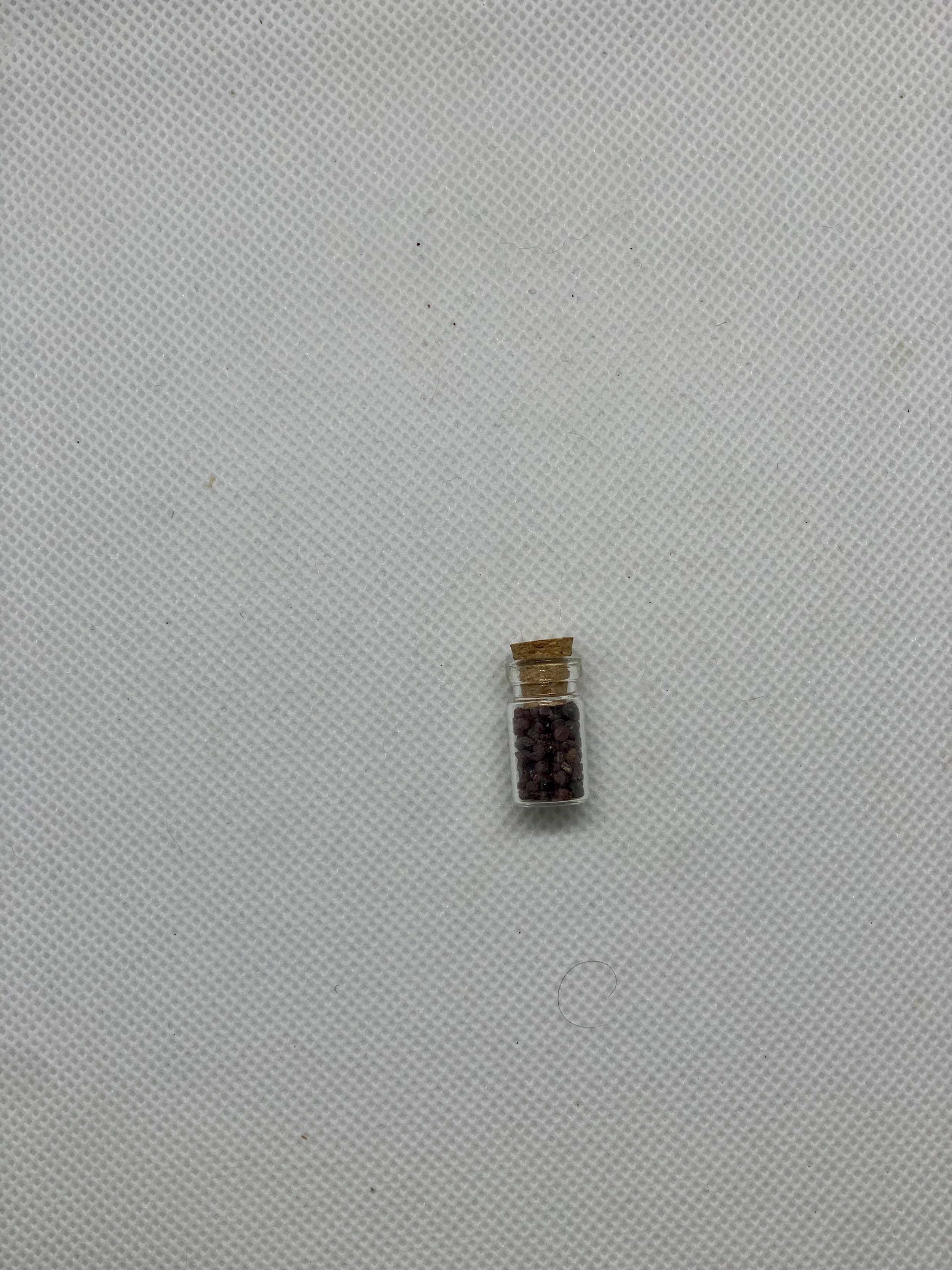 Bottle of Connecticut garnets