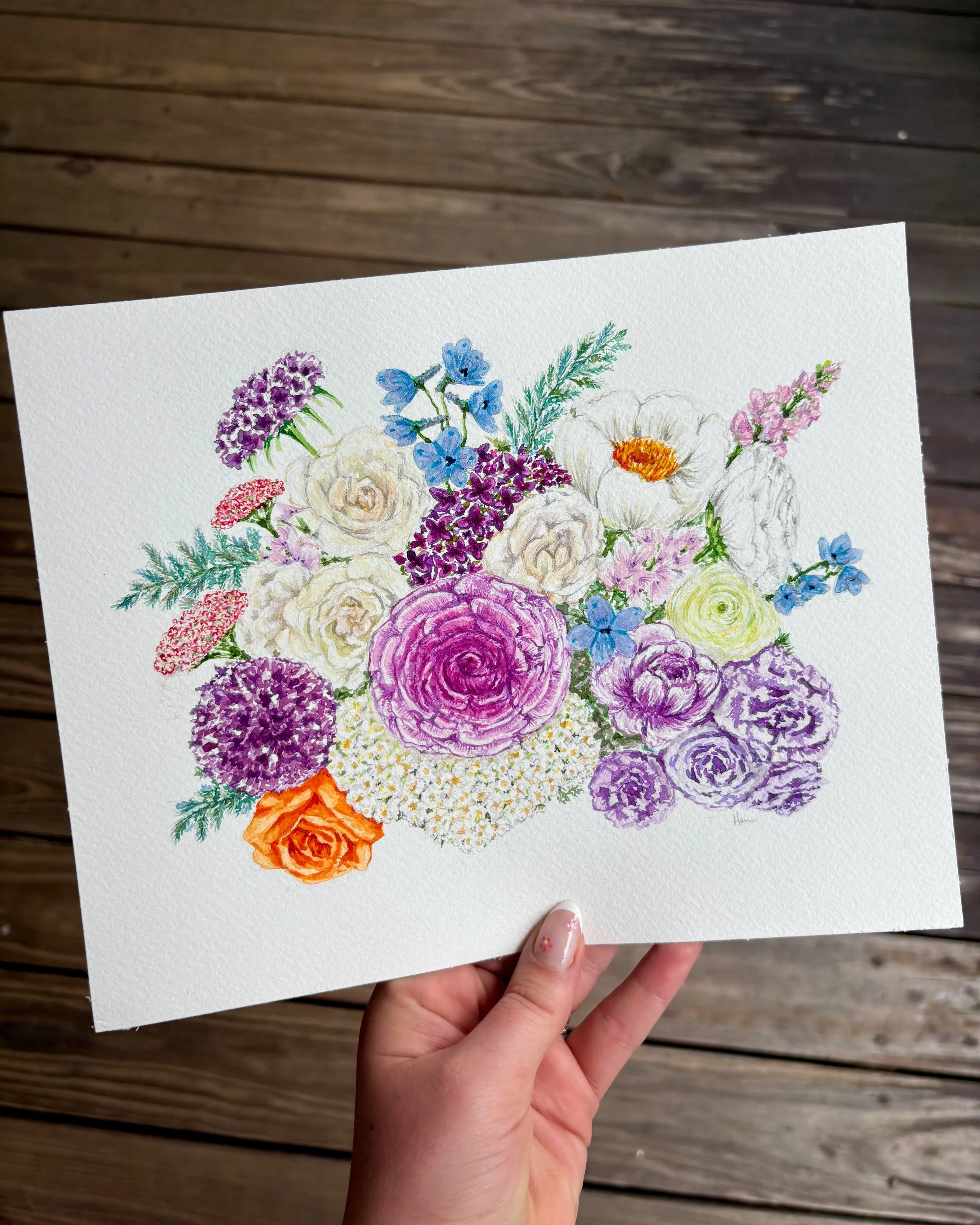 Watercolor painting of a colorful bouquet of various flowers, including roses, ranunculus, and delphiniums, held in a person's hand.
