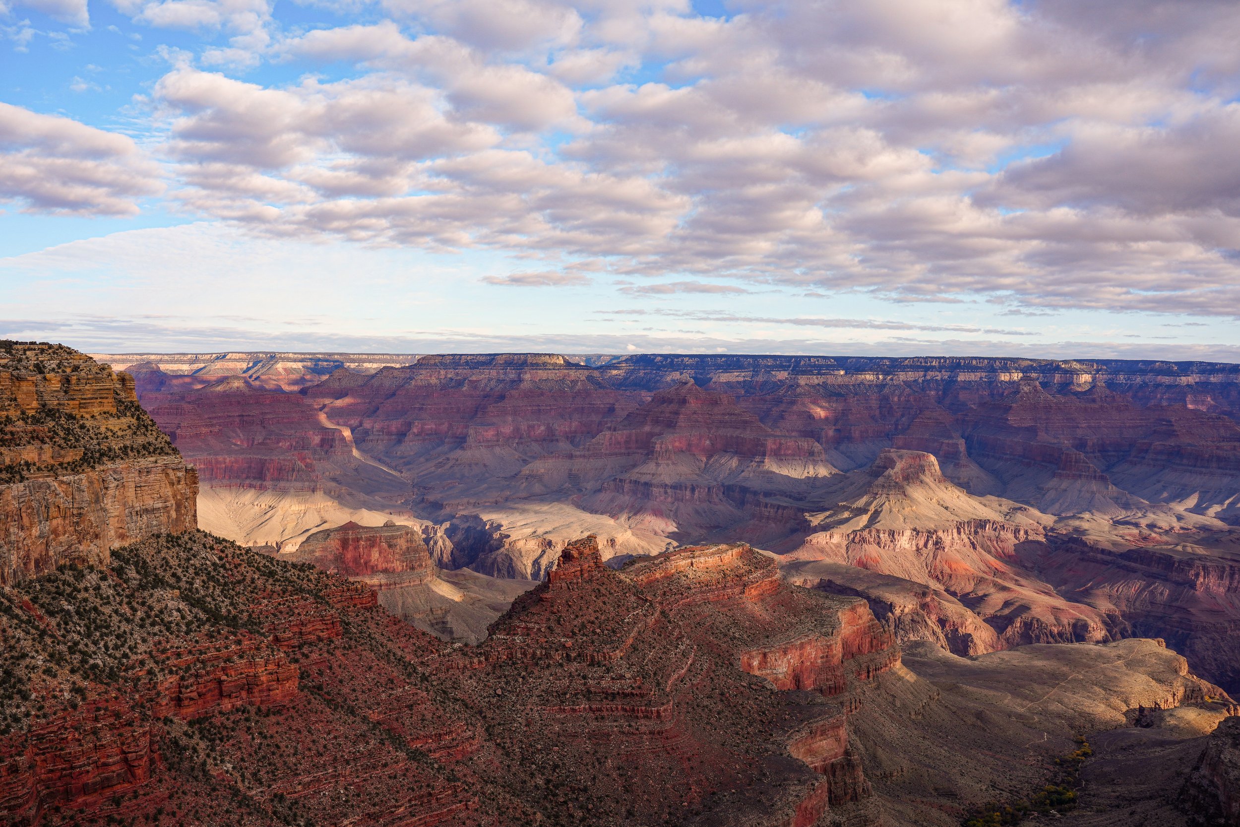 Landscape nature photo of the Grand Canyon after sunset looking north from the south rim in Arizona.