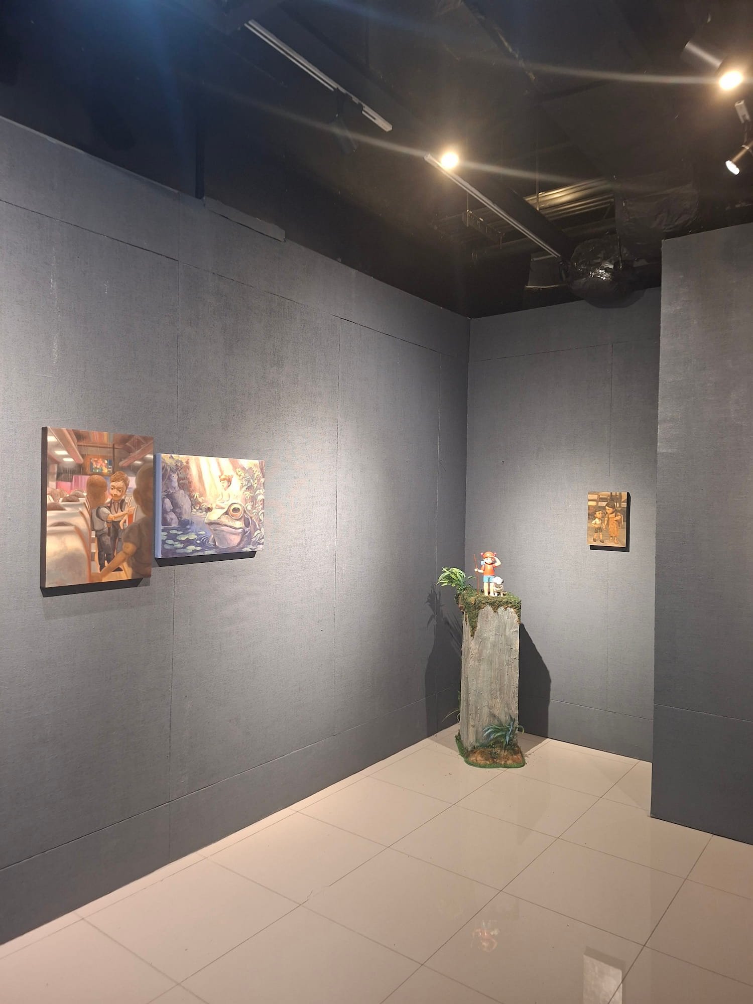 a corner view of a way out of the woods exhibition