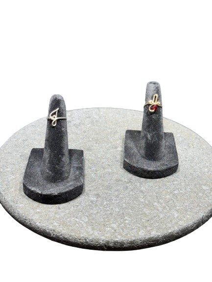 Handcrafted wire initial ring featuring a custom letter design.